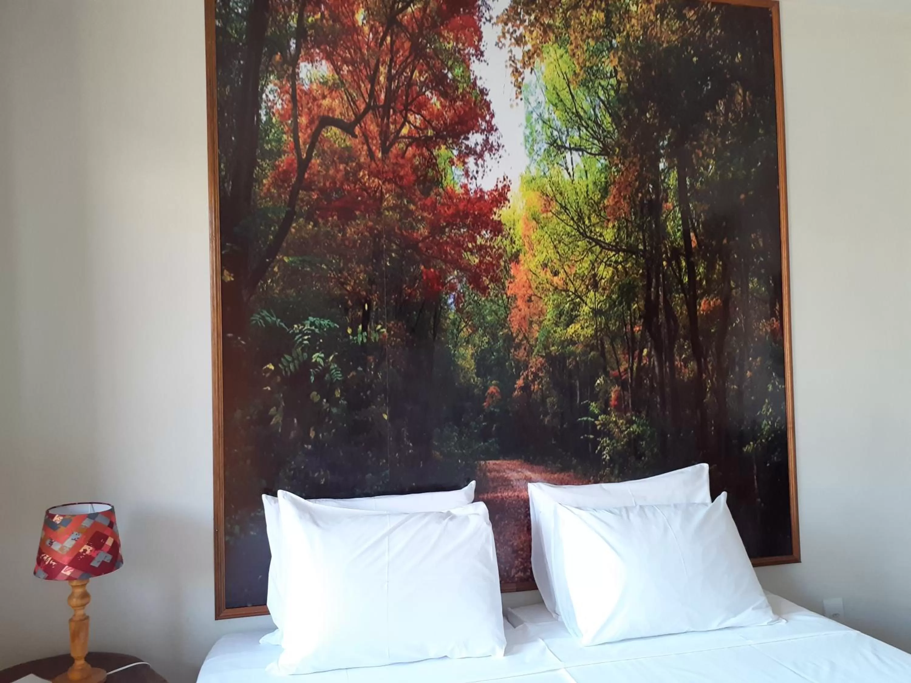 Bed in Pousada R.N.C. Nosso Paraíso