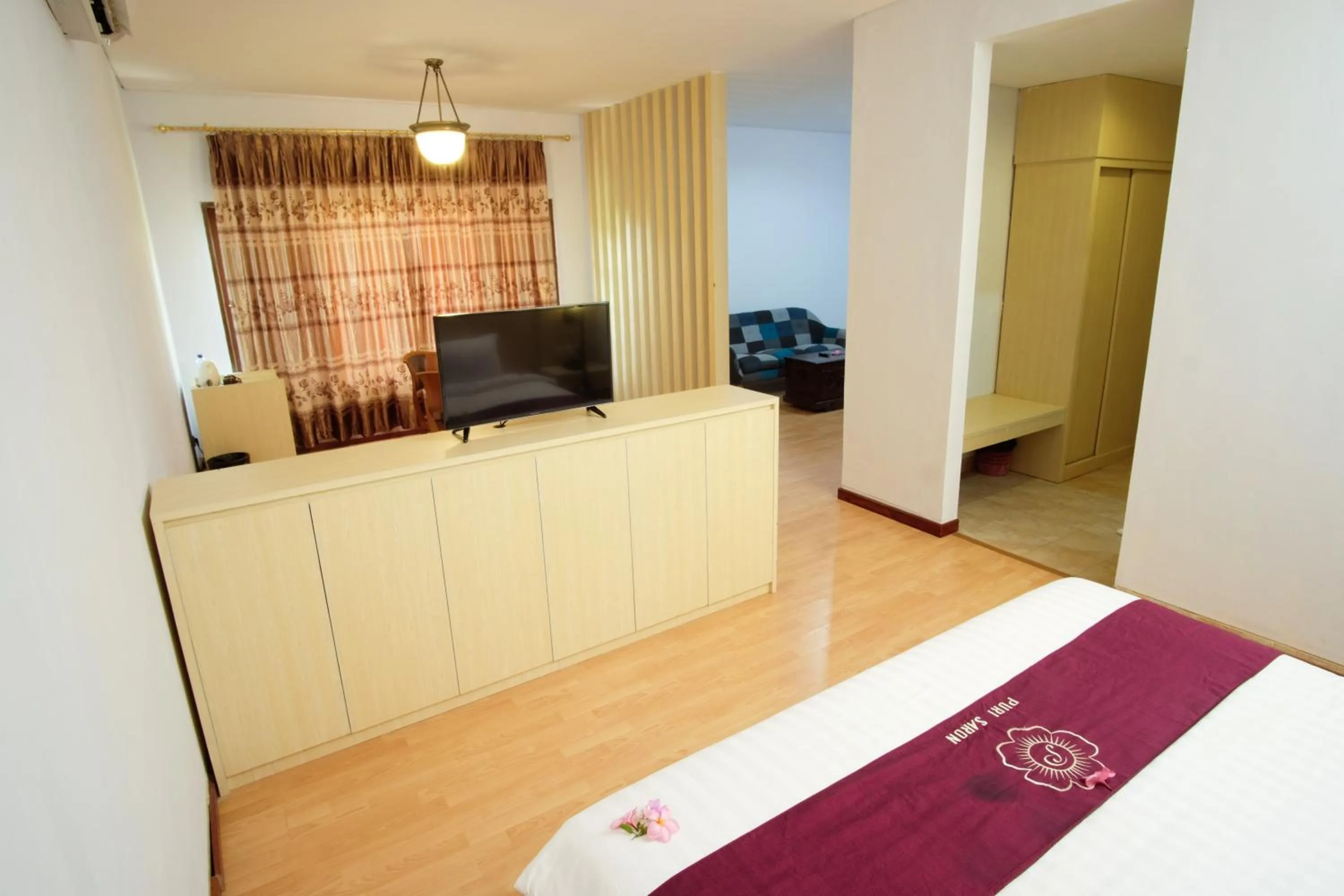 Living room, Bed in Puri Saron Senggigi Hotel