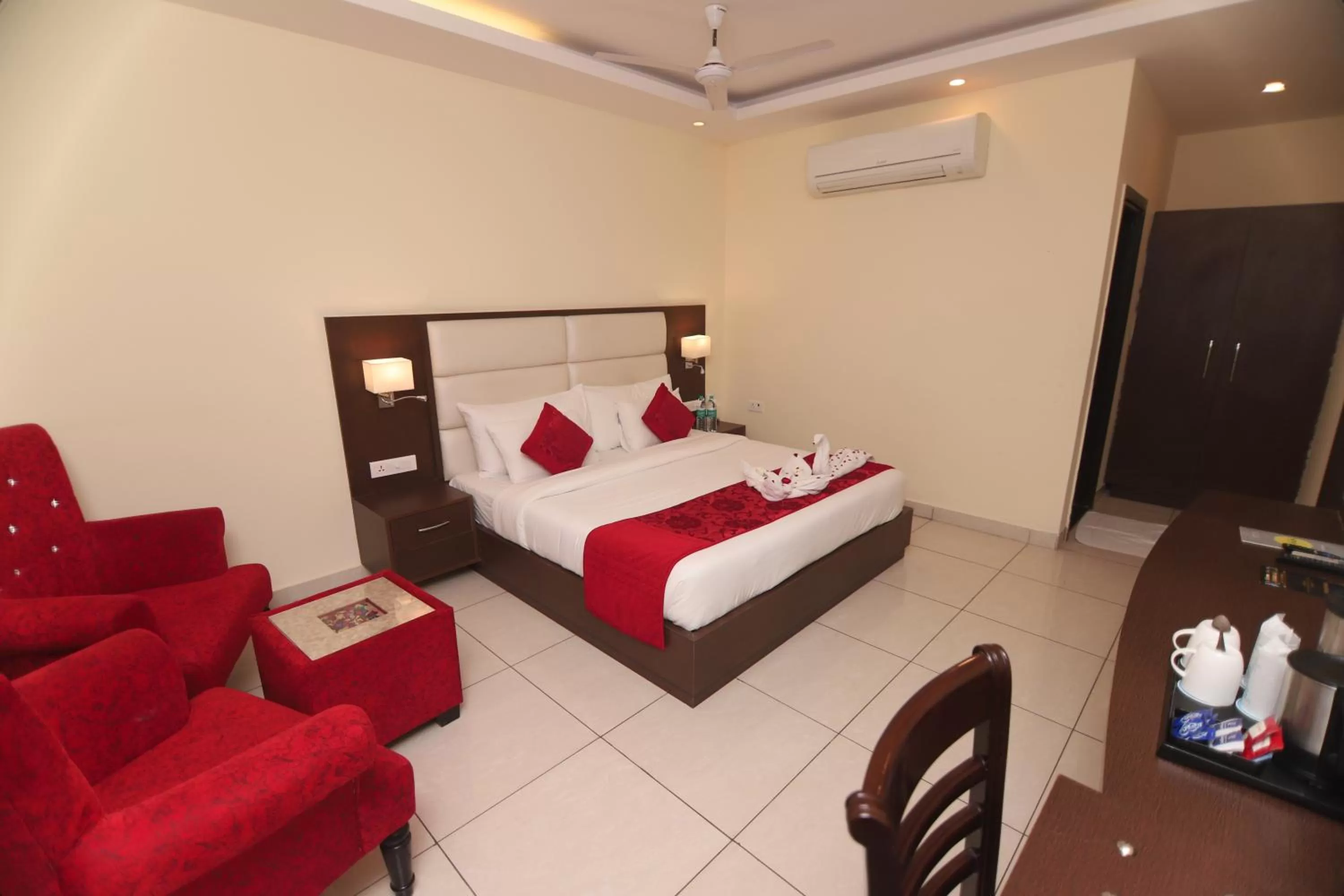 Photo of the whole room, Bed in Indira Nikunj Rubystone Exotic