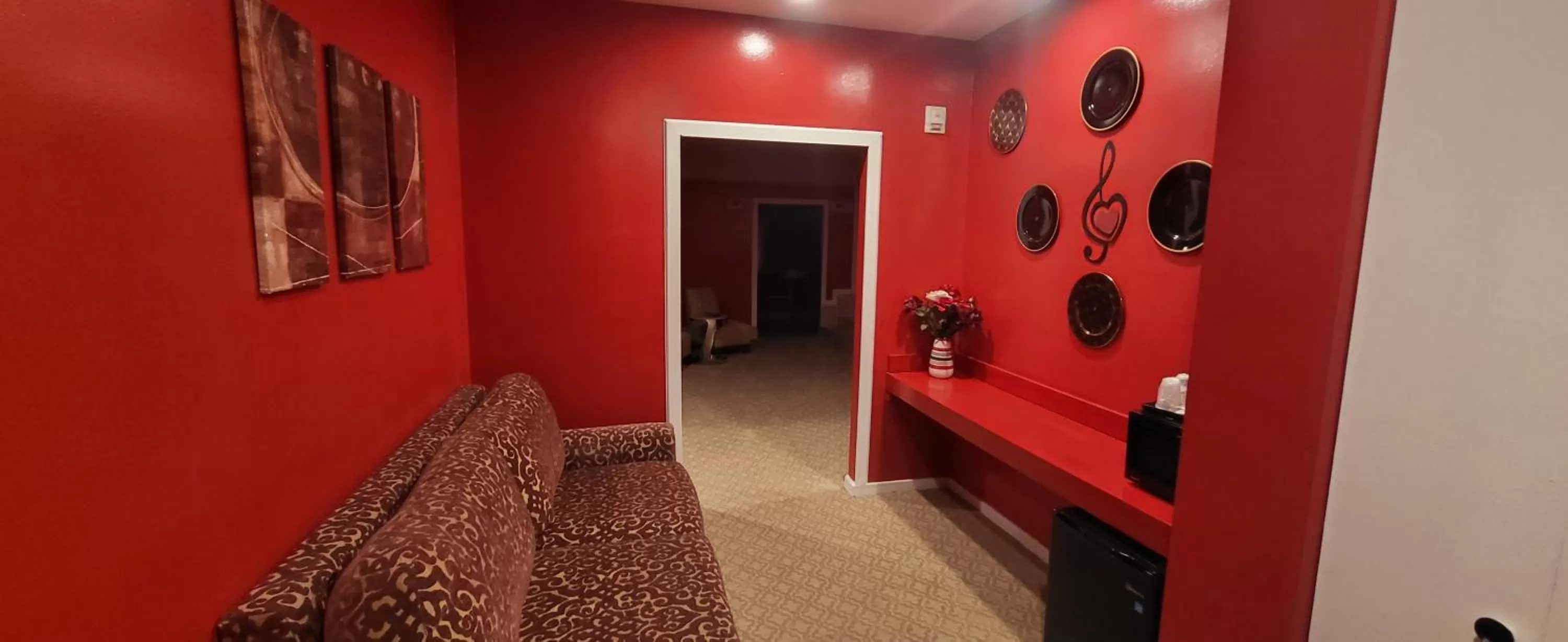 Seating area, Bed in Inn of the Dove - Romantic Luxury Suites with Jacuzzi & Seasonal Fireplace at Harrisburg-Hershey-Philadelphia, PA