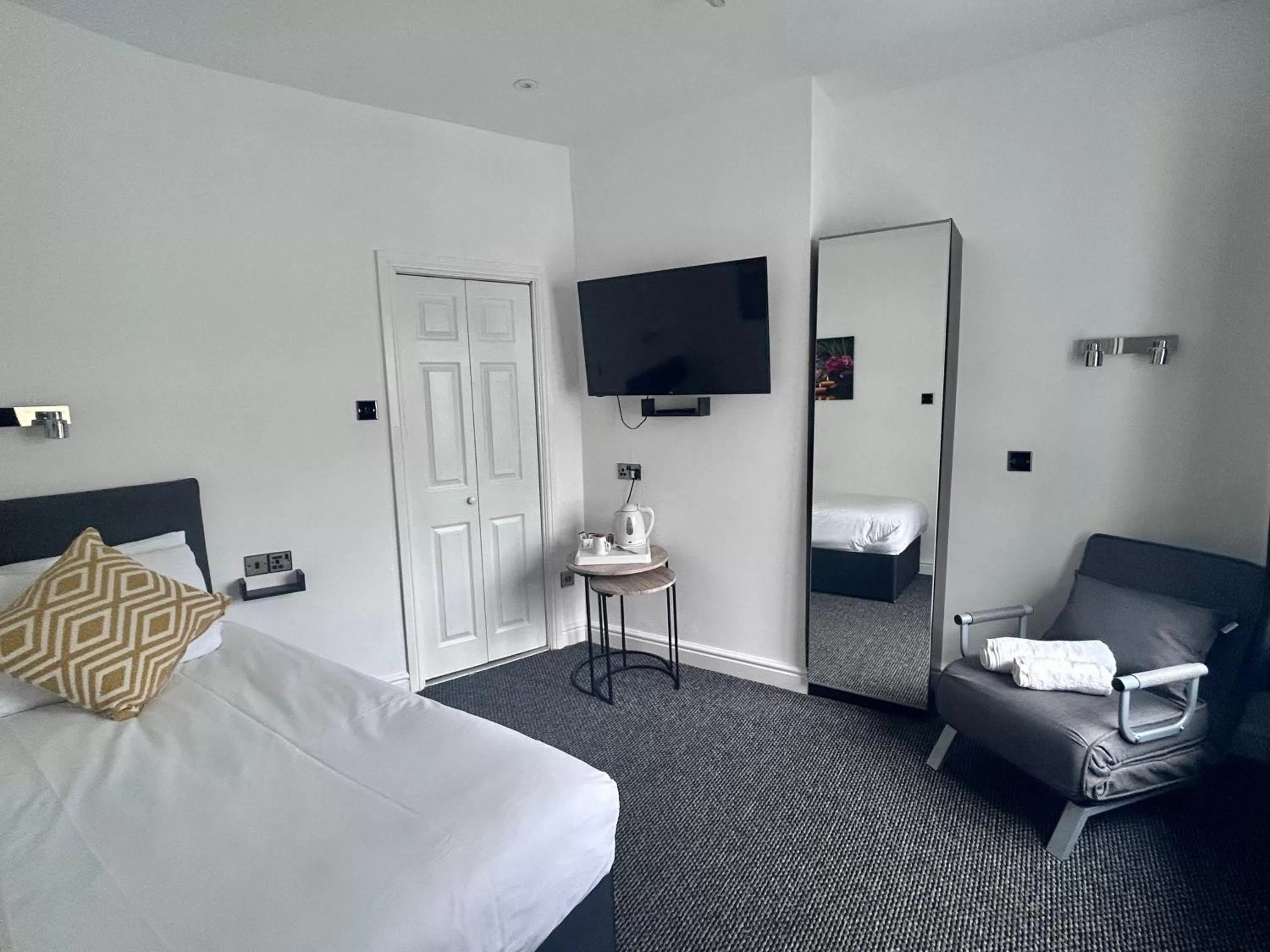 Bed in Charnwood Regency Guest House