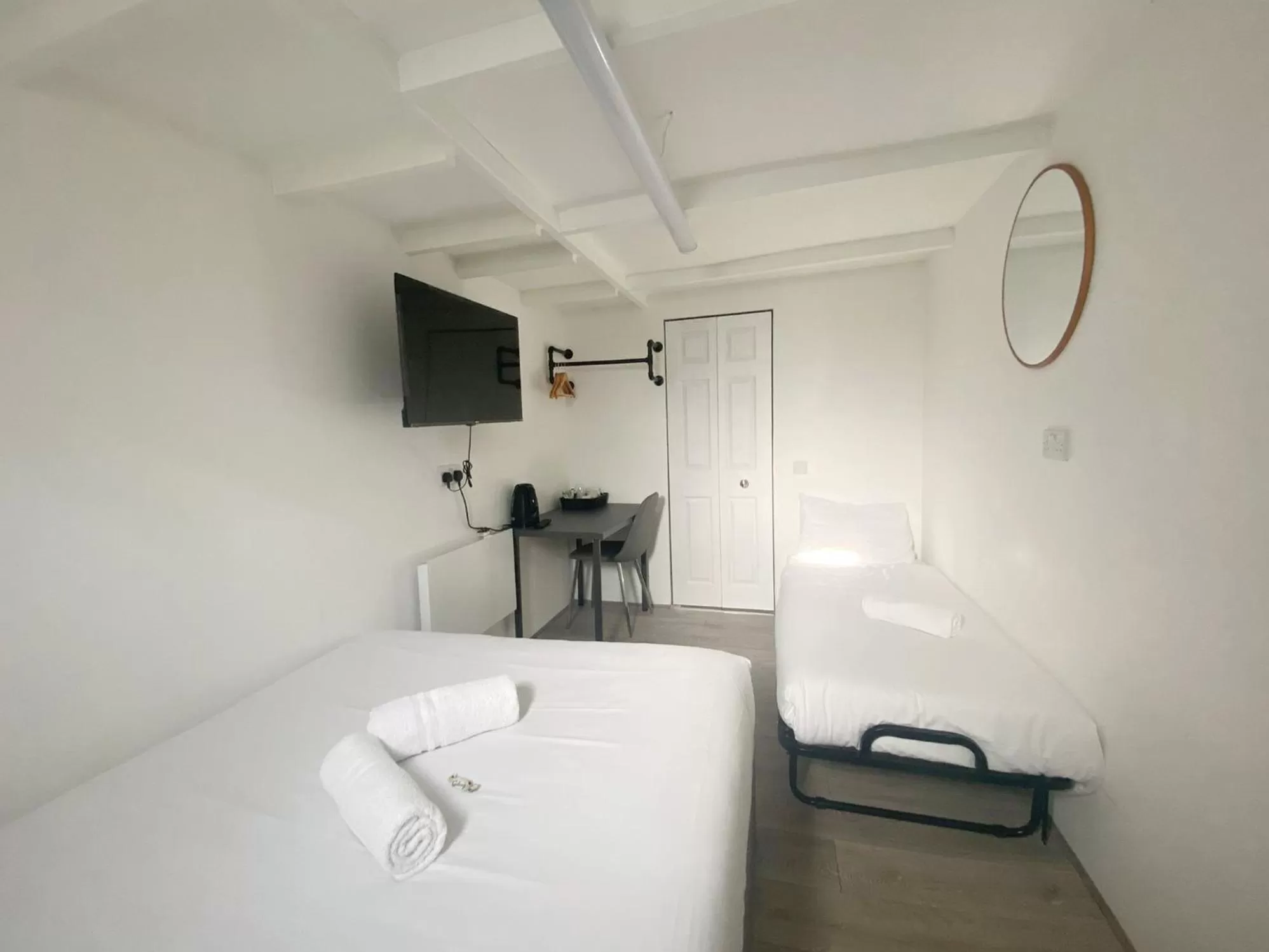 Bed in Anchor Guest House