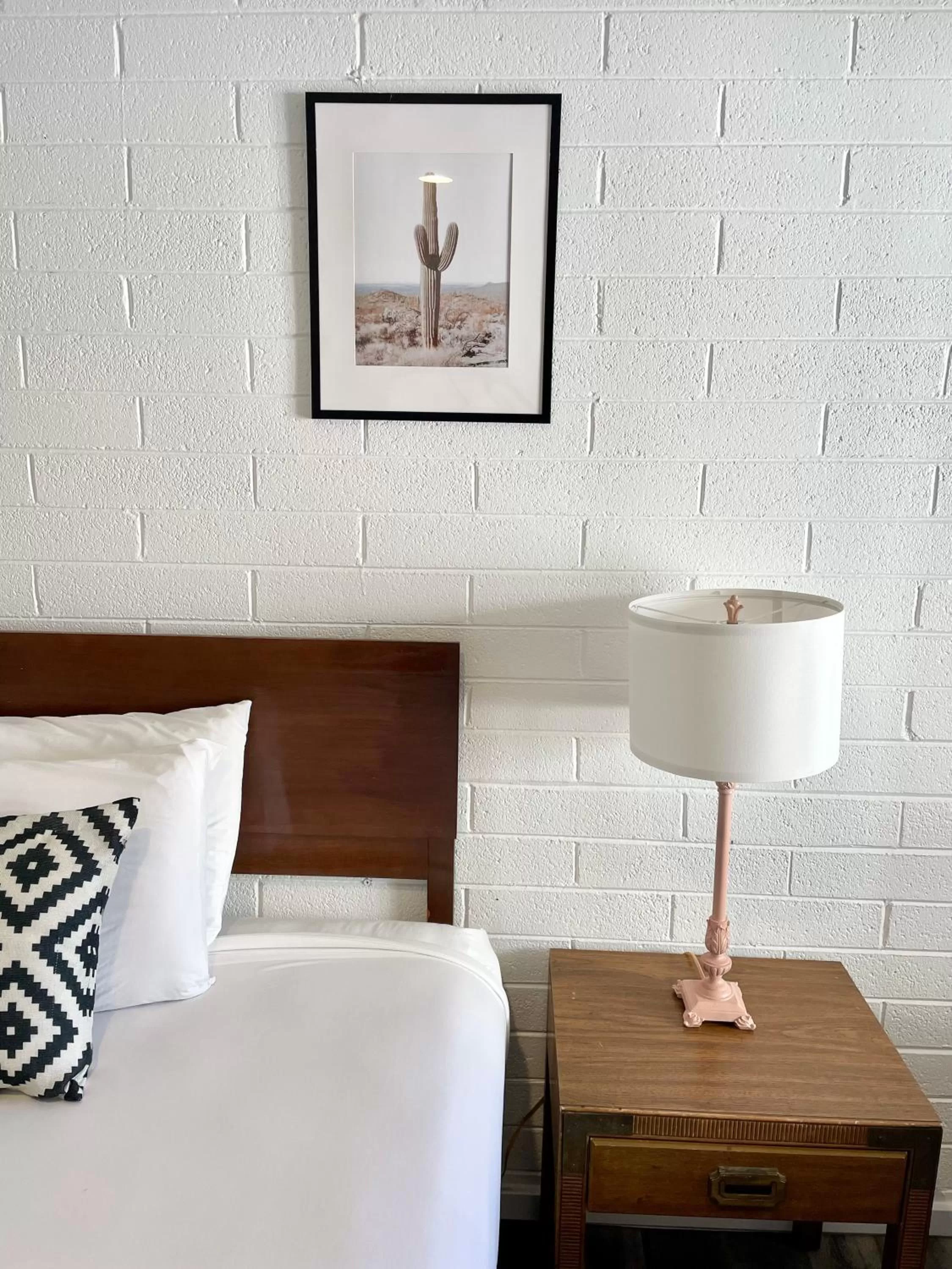 Bed in The Postcard Motel