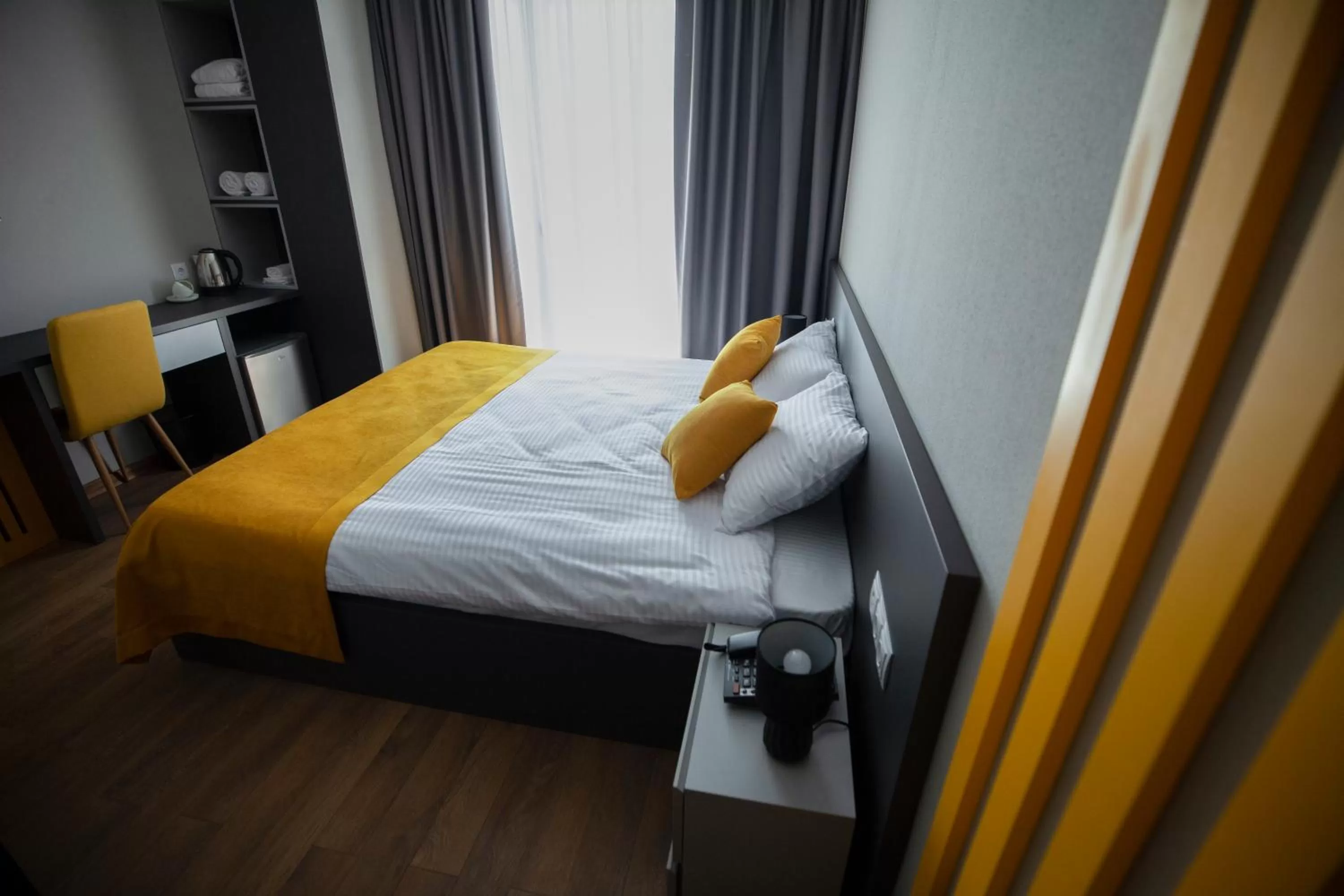 Photo of the whole room, Bed in Old City Boutique Hotel