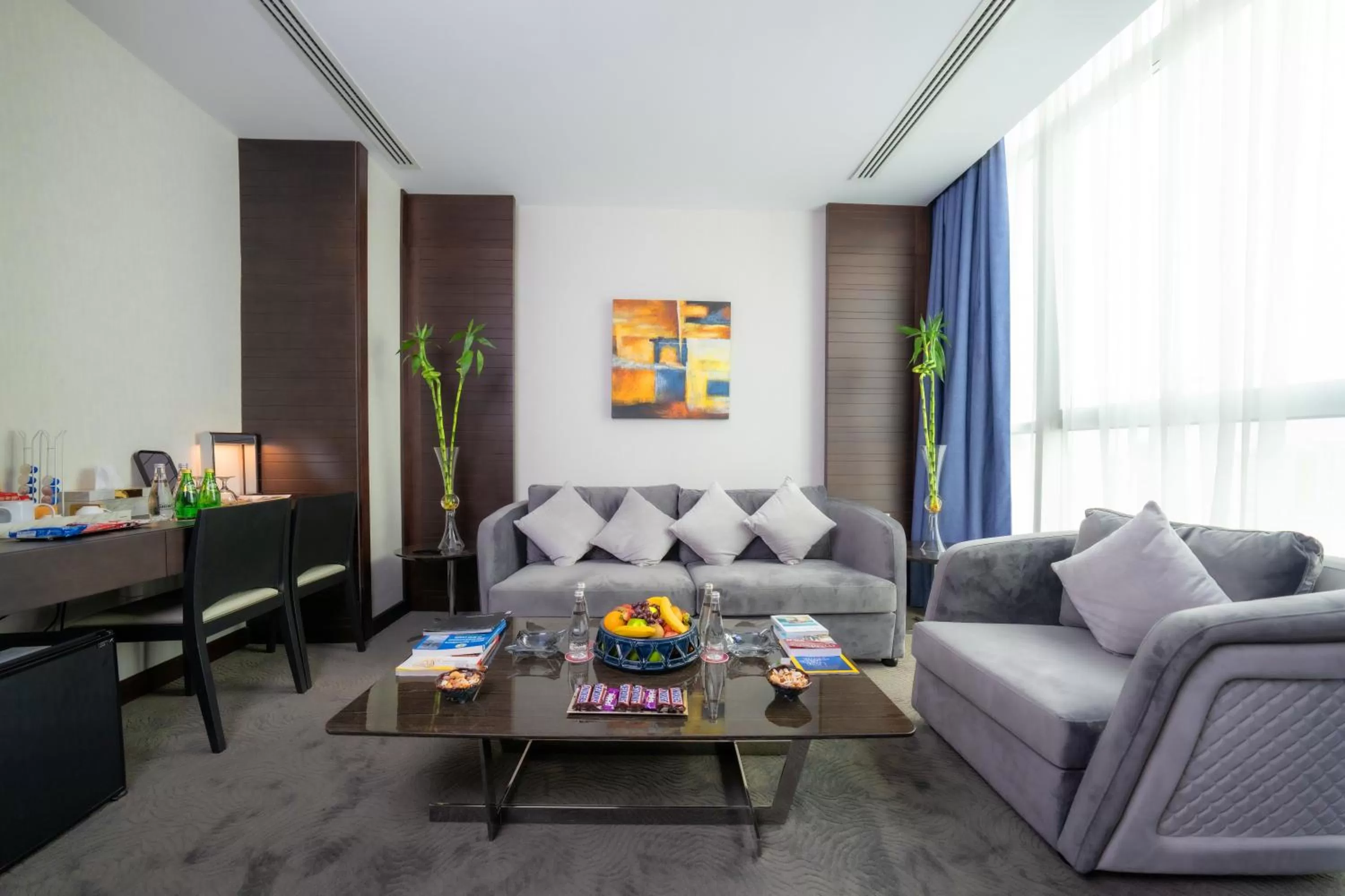 Living room in Ramada Encore Doha by Wyndham