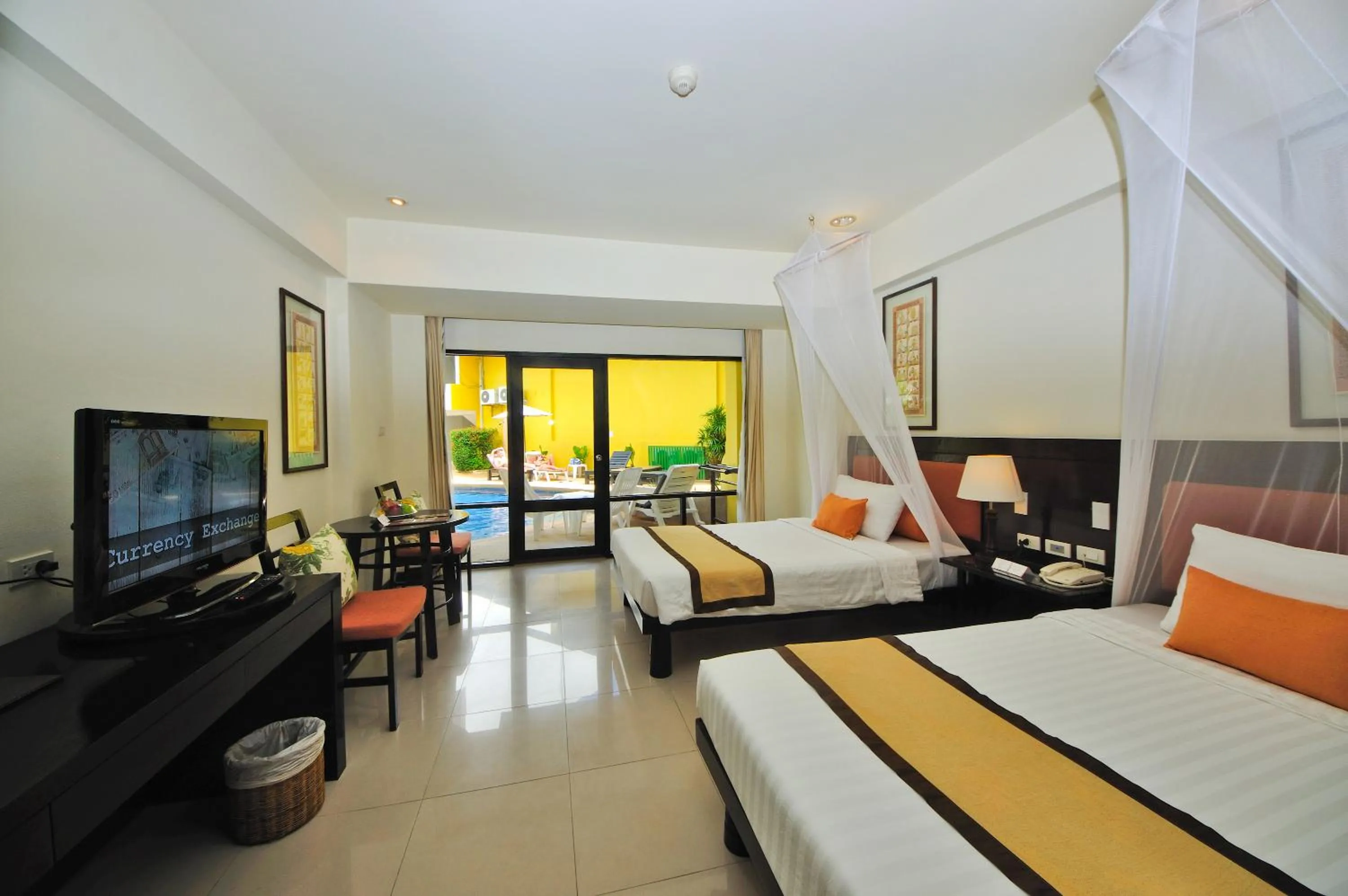 Photo of the whole room, Bed in Woraburi Phuket Resort & Spa - SHA Plus