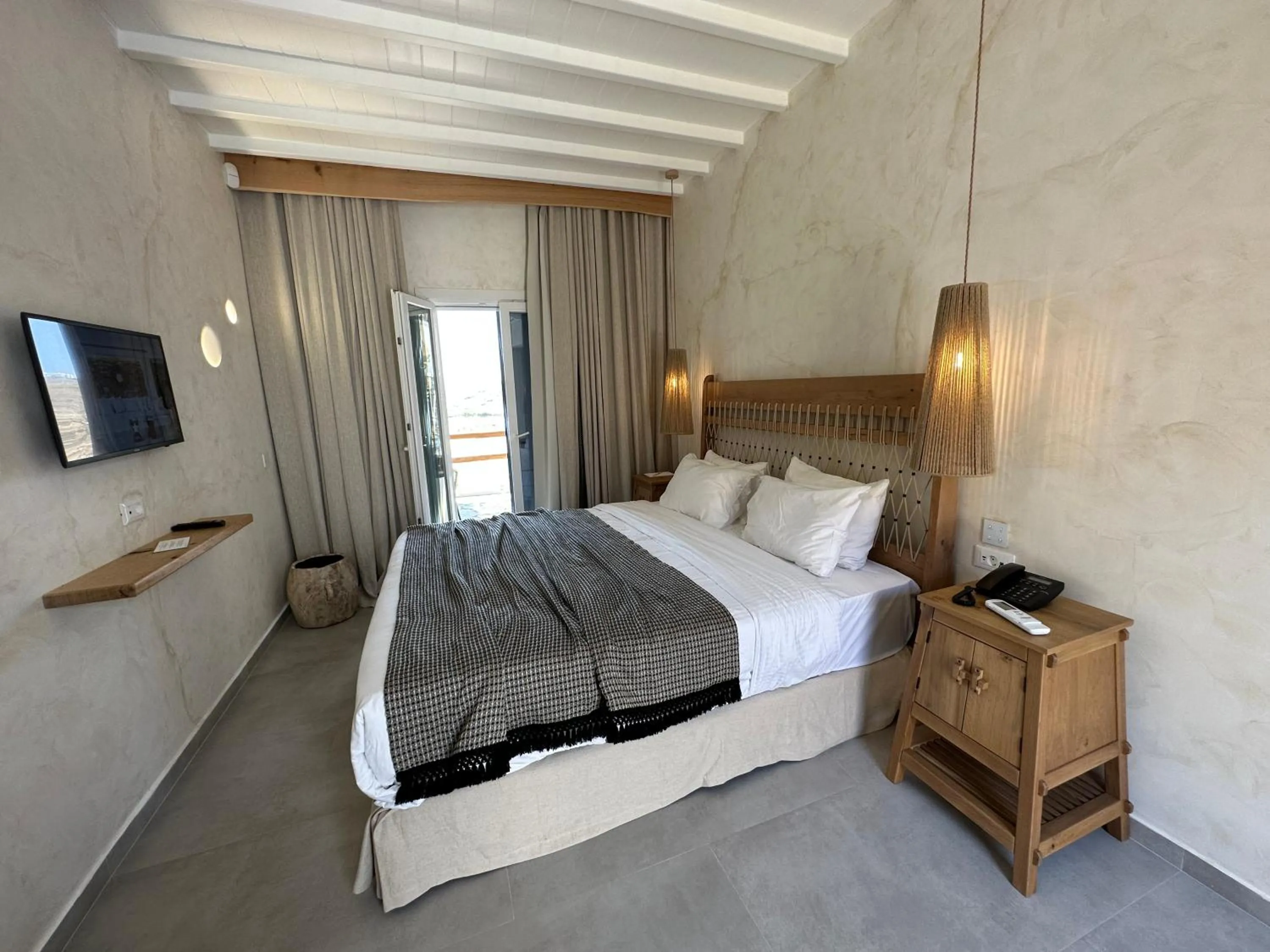 Bed in Panormos Village Hotel