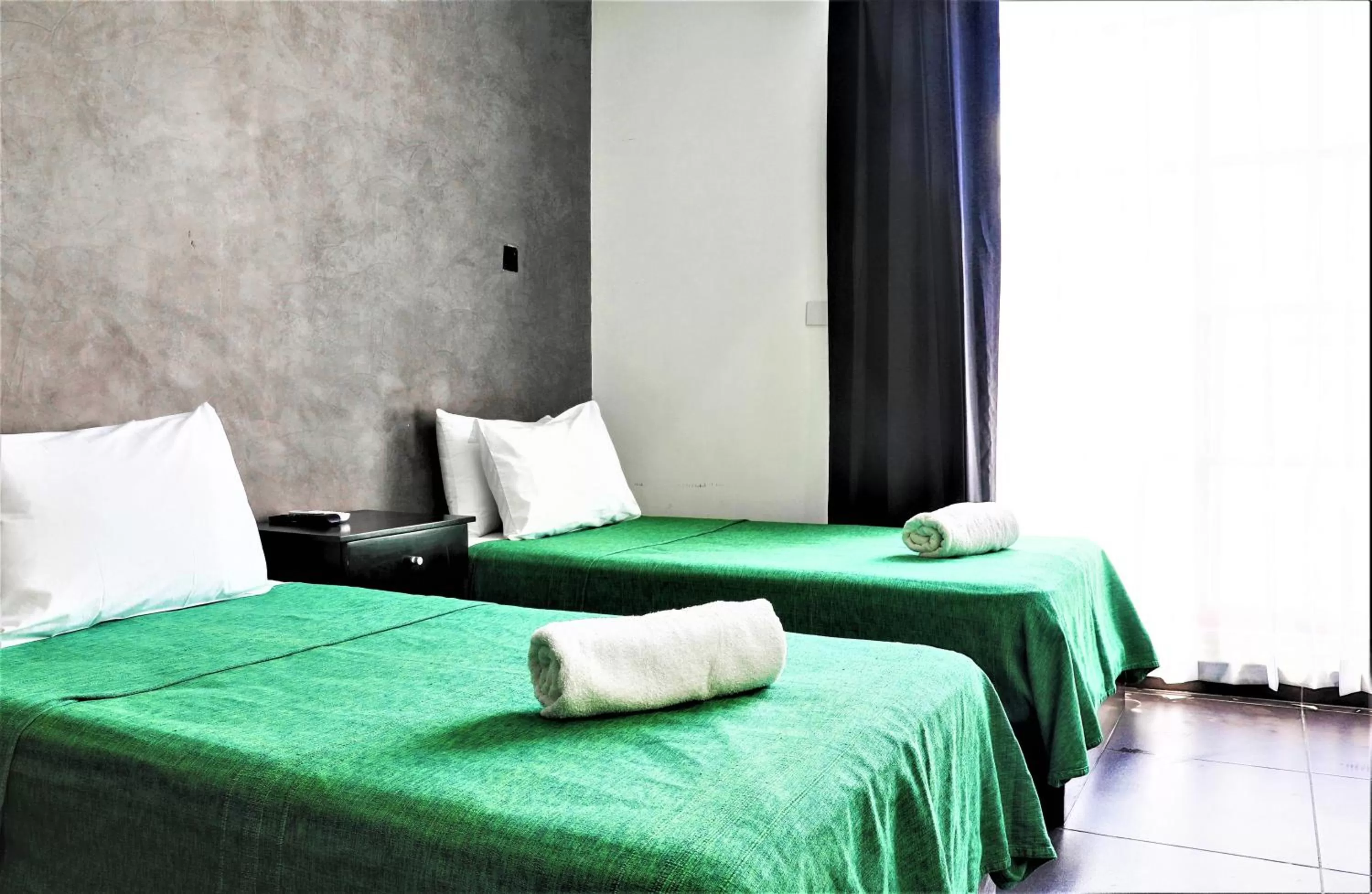 Photo of the whole room, Bed in Hotel Colonial Playa del Carmen