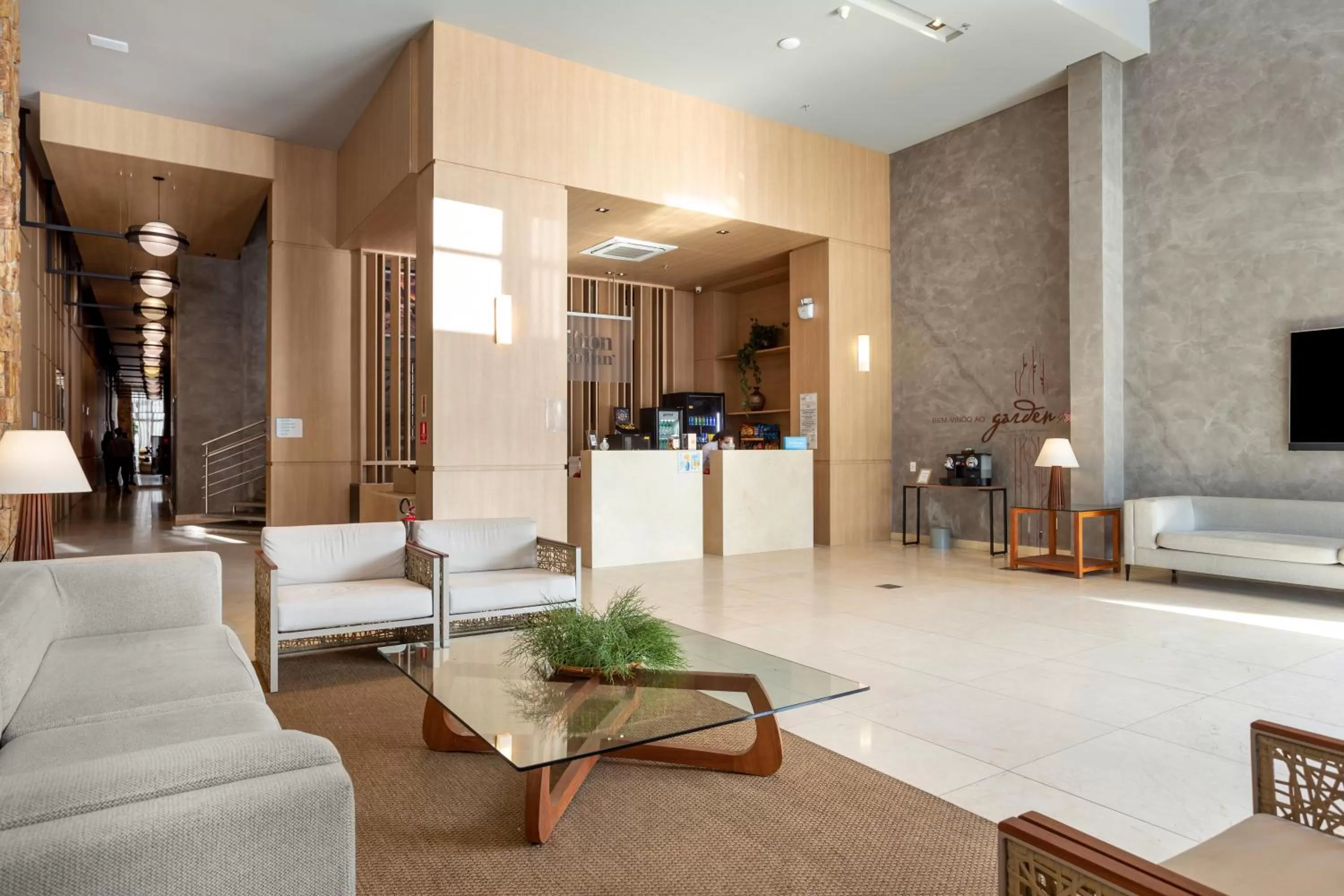 Lobby or reception in Hilton Garden Inn Praia Brava