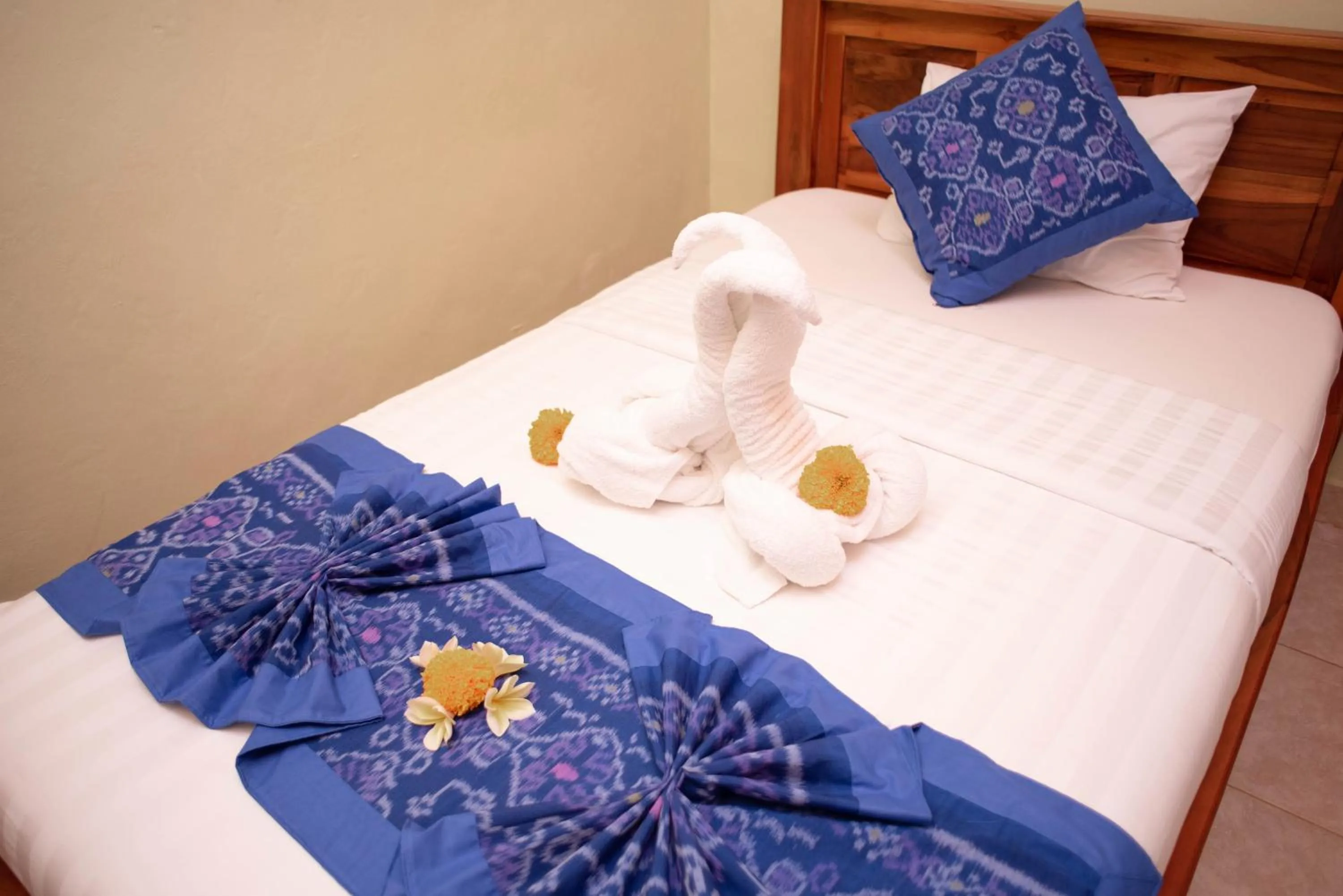 Bed in Suparsa's Homestay