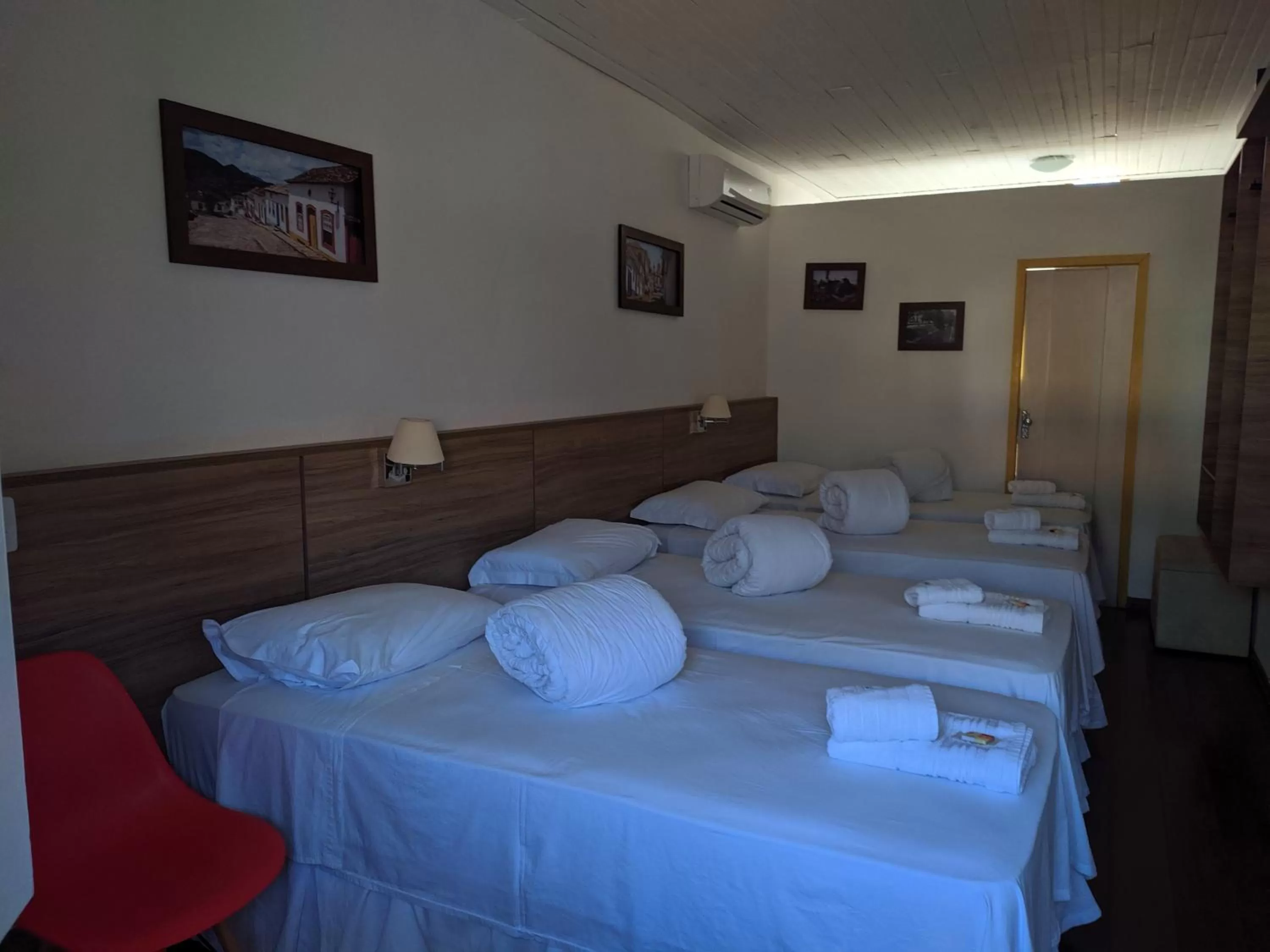 Bed in Pousada o Amanhecer