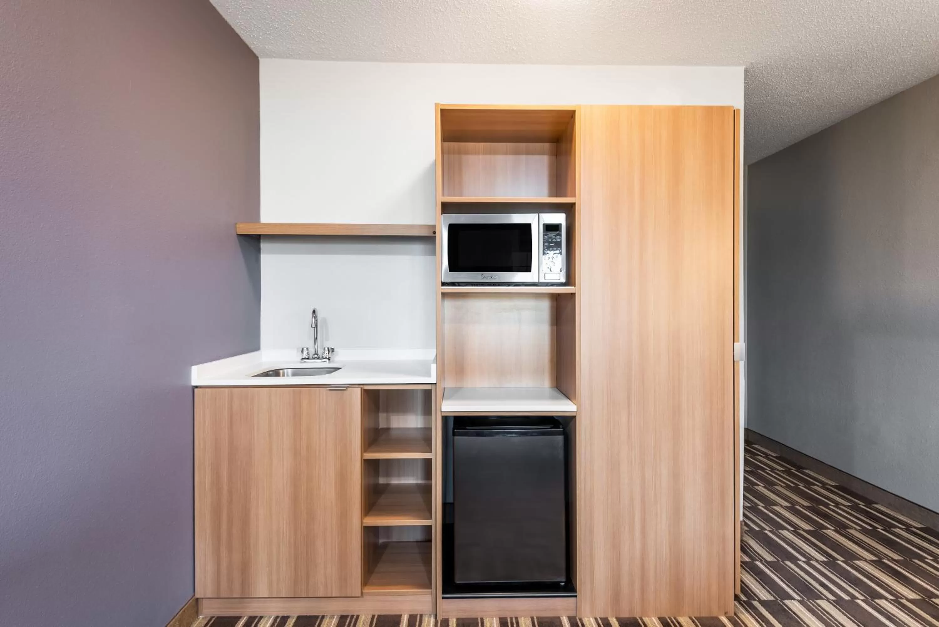 Kitchen or kitchenette in Microtel Inn & Suites by Wyndham Beaver Falls