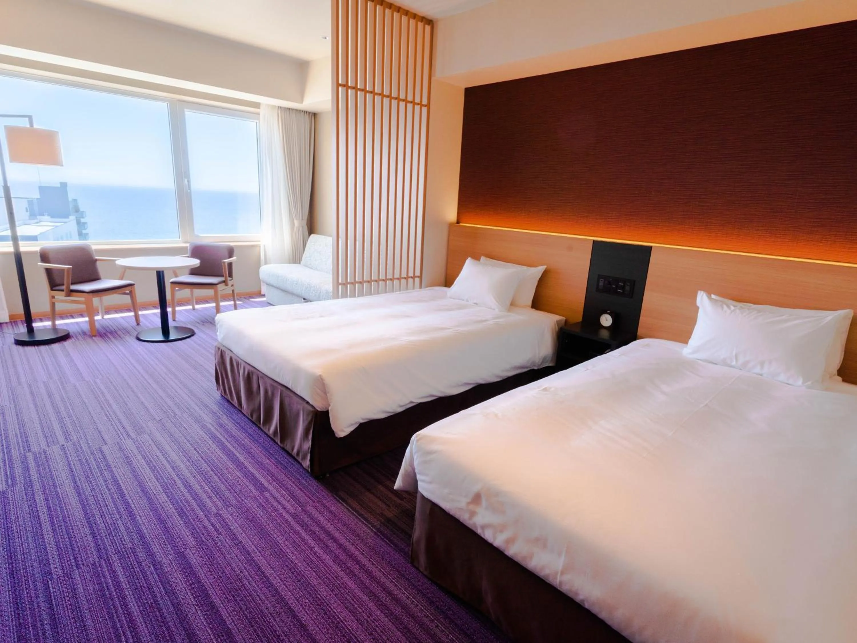 Bed in Hakodate Yunokawa Onsen Umi to Akari Hewitt Resort