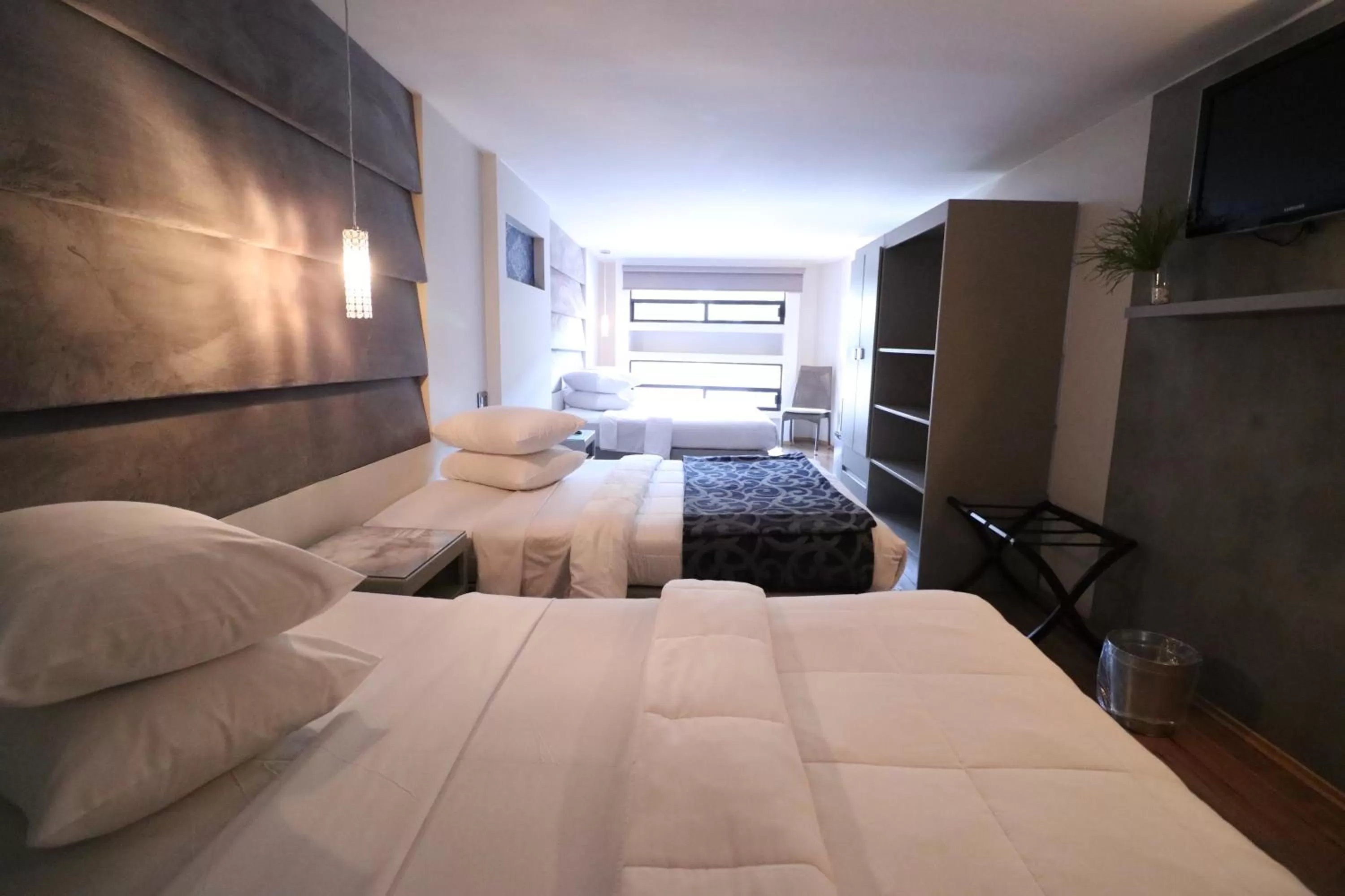 Bed in Hotel Posada Tulancingo