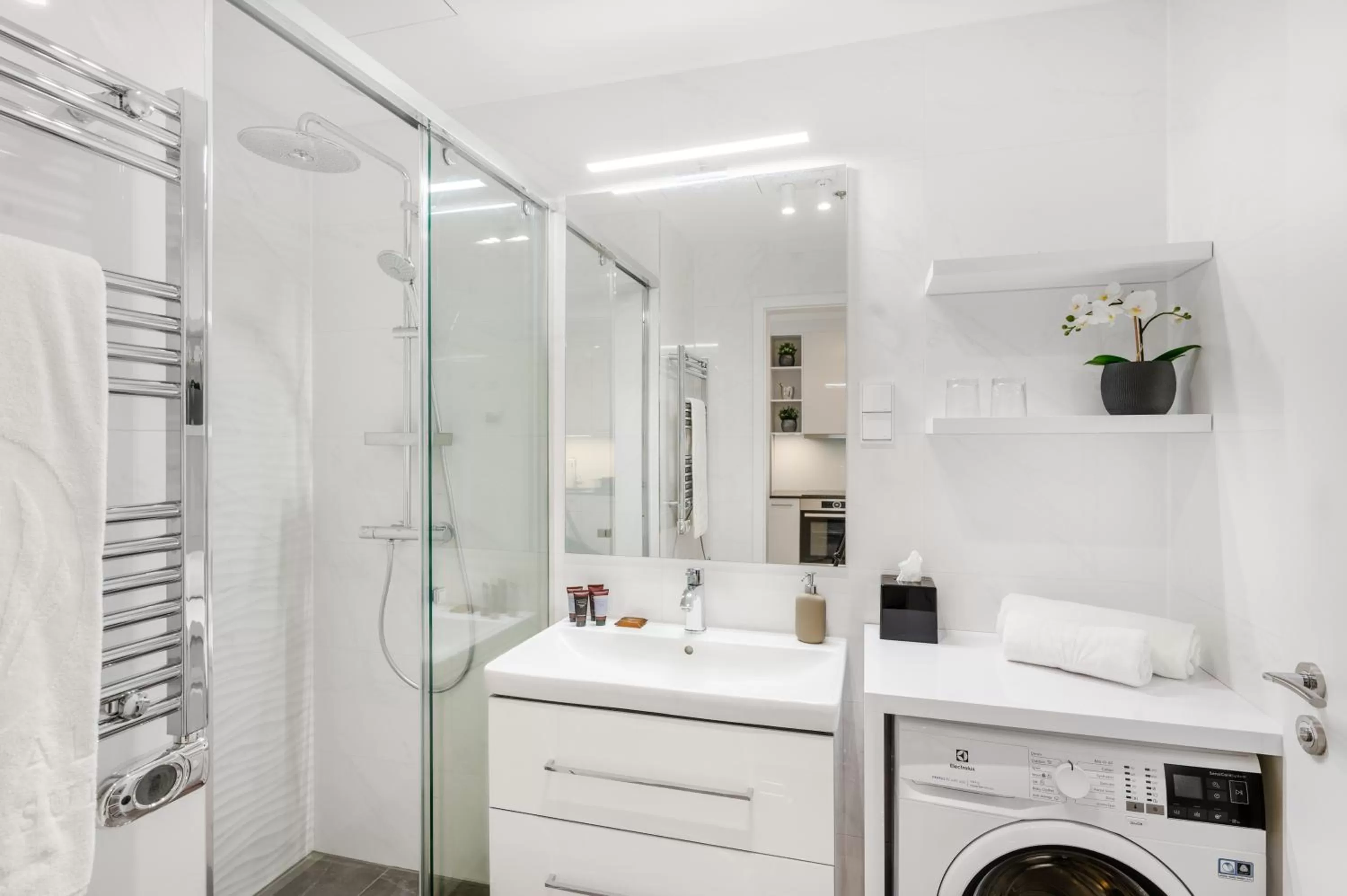 Shower in Emerald Downtown Luxury Suites by Continental Group