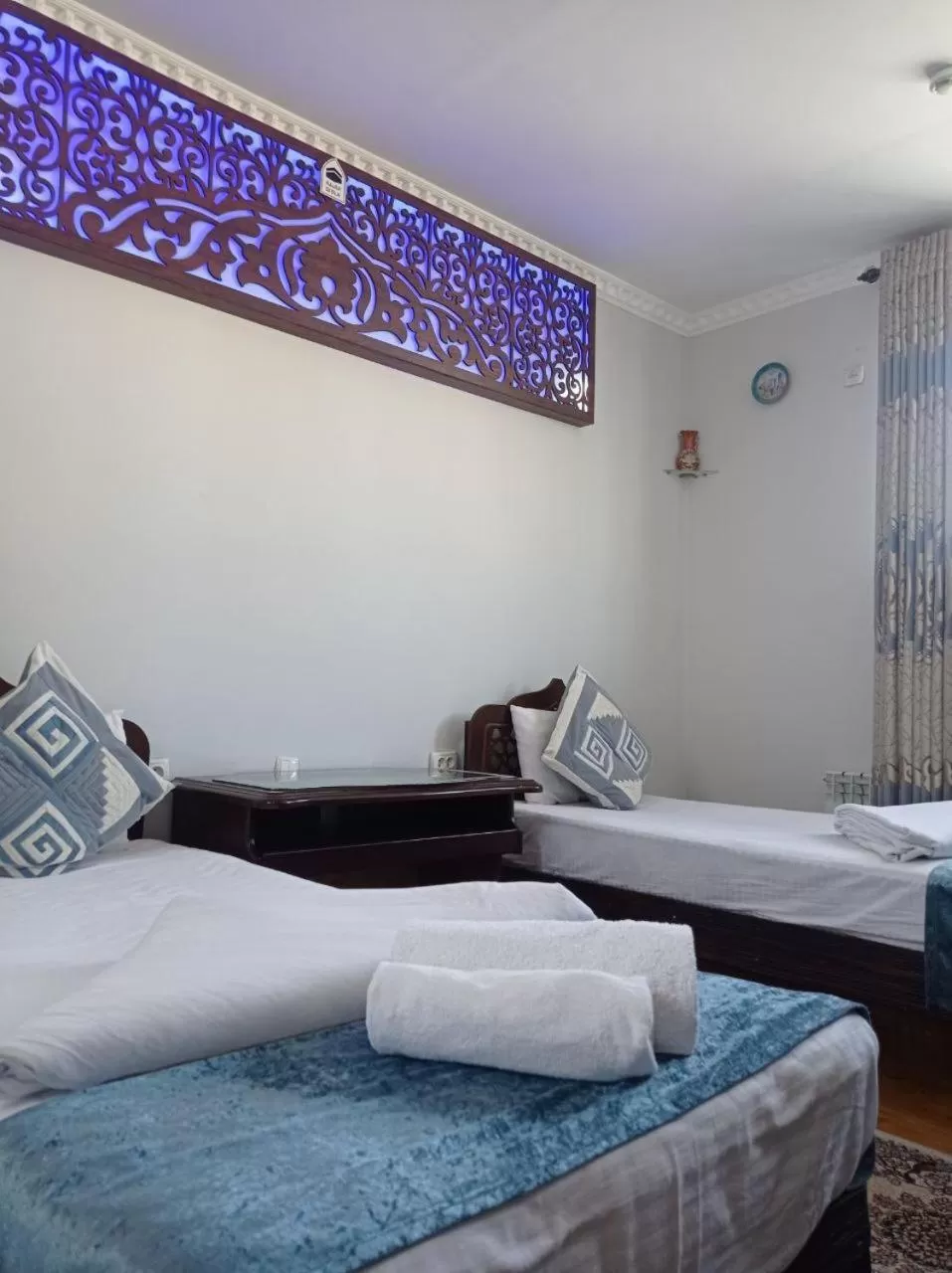 Bed in Risqiro'z Ancient Boutique Hotel