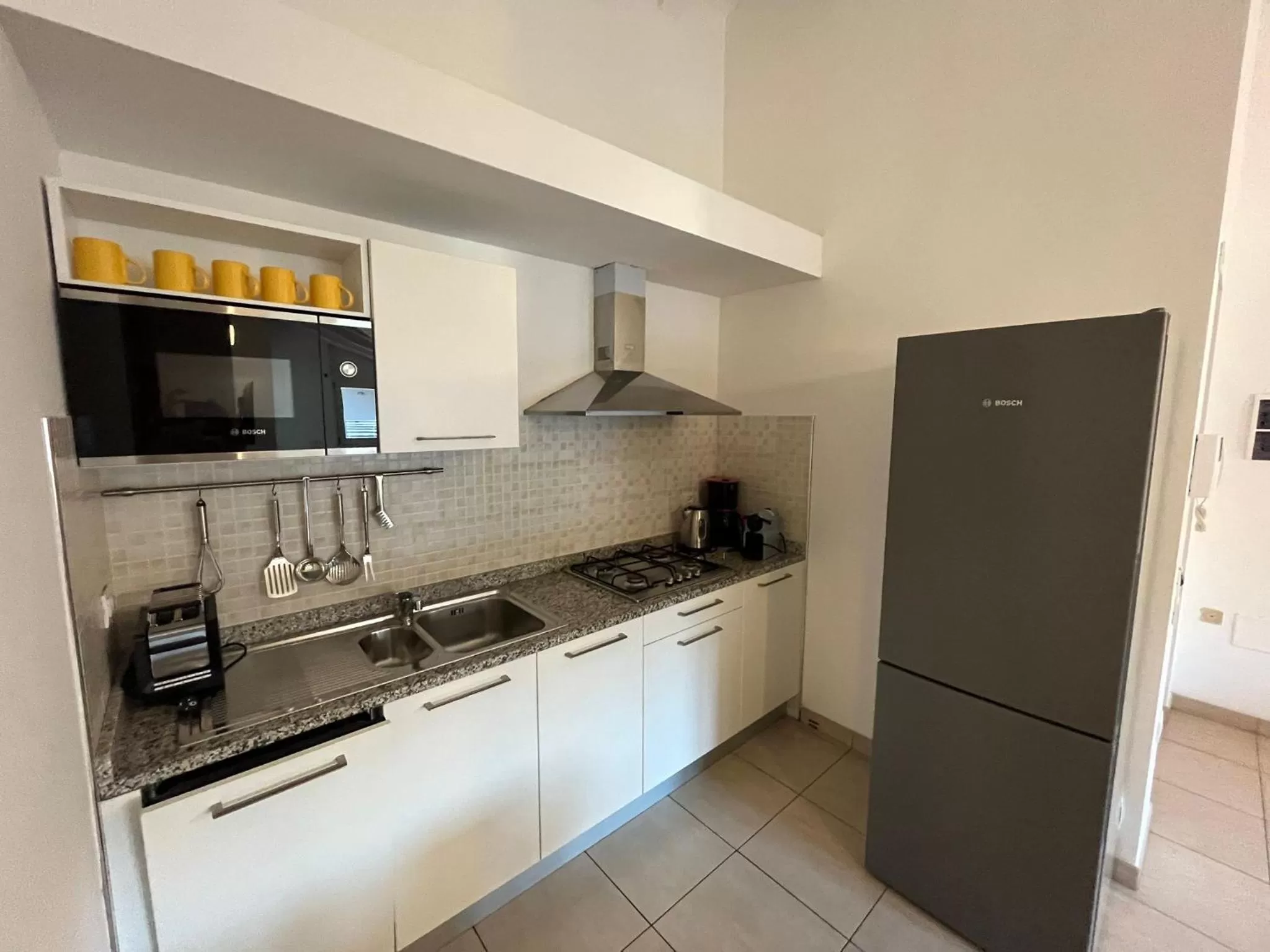 Kitchen or kitchenette in 4 Limoni Apartment Resort