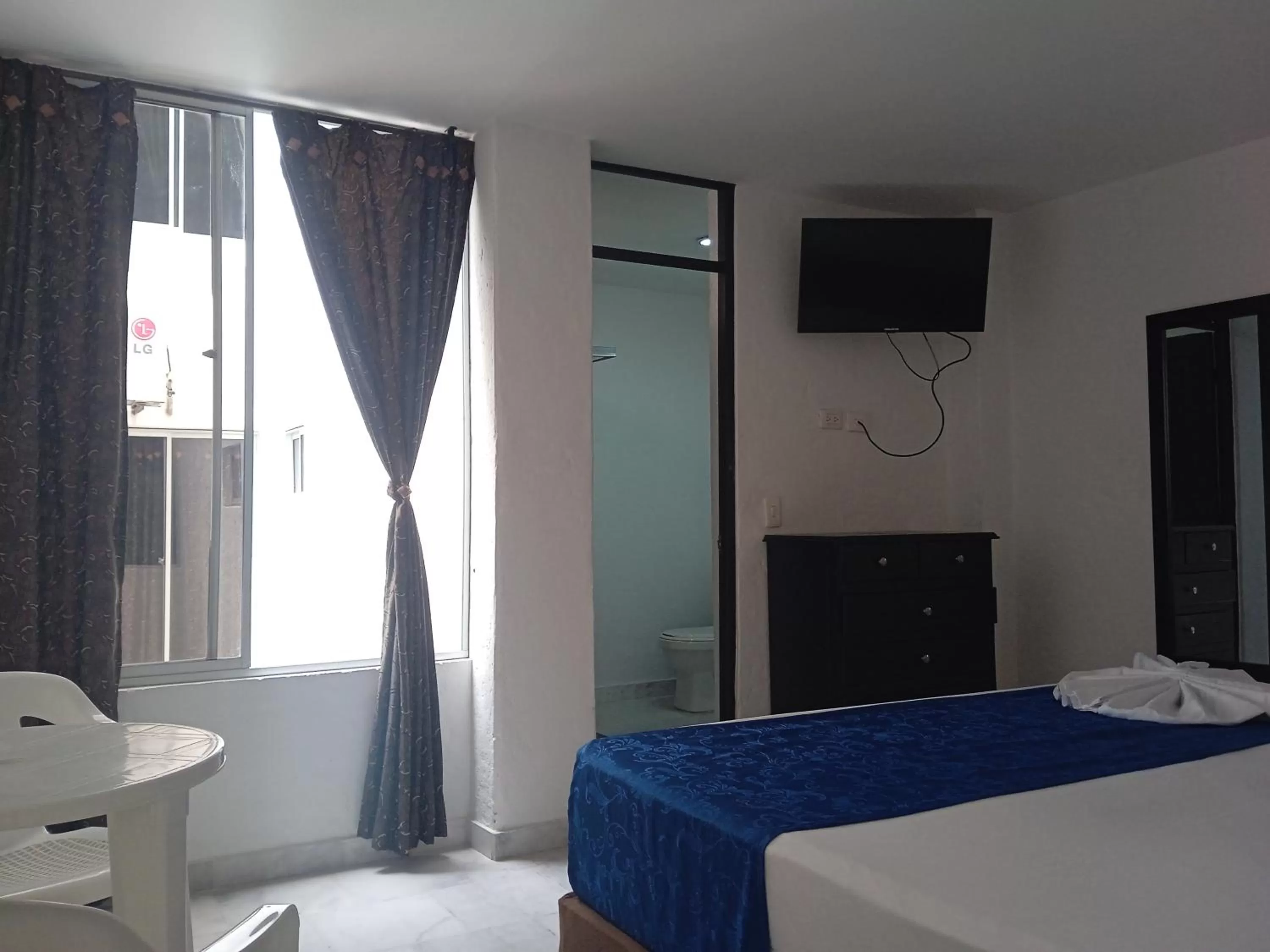 Bed in Blue Star Hotel