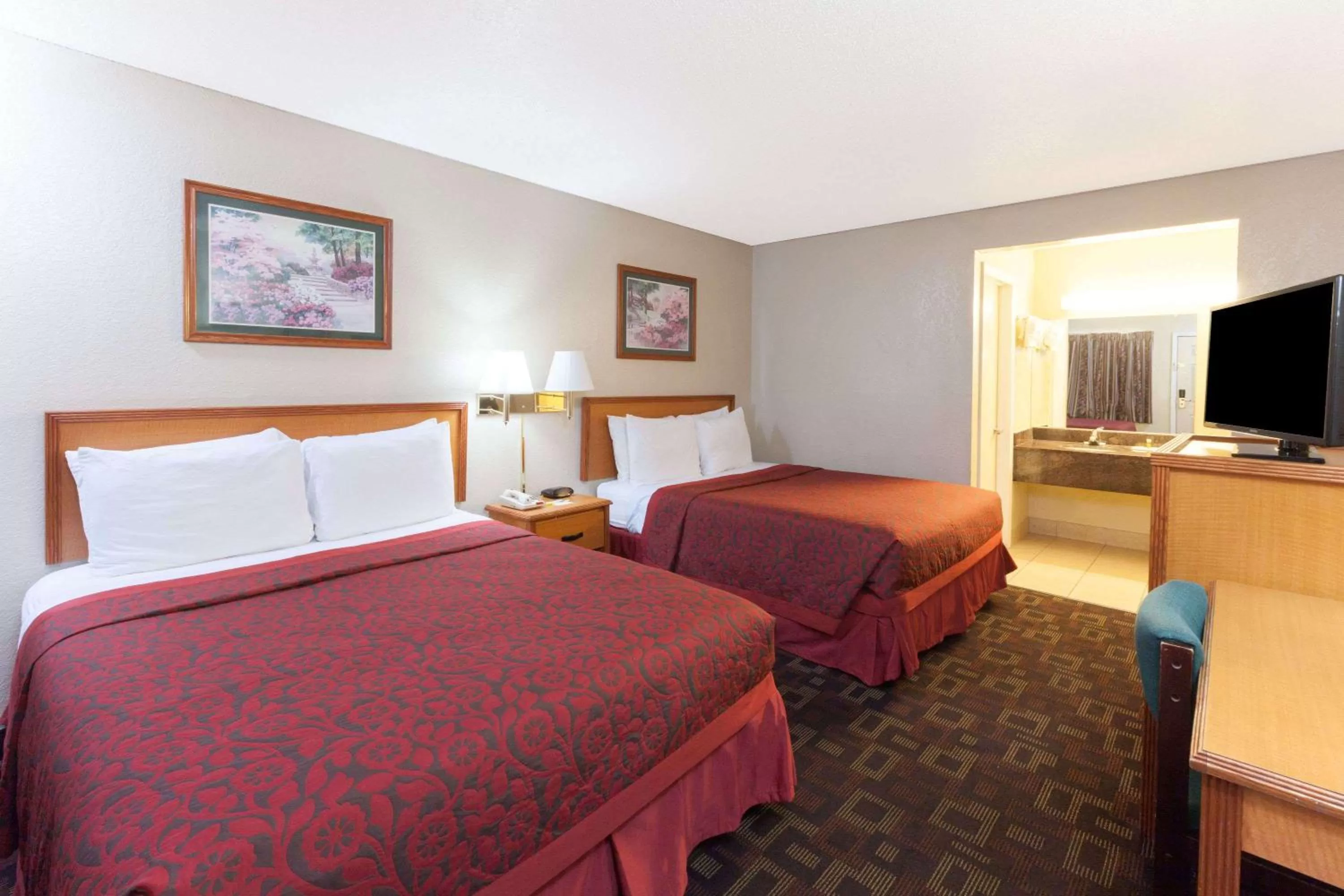 Photo of the whole room, Bed in Days Inn by Wyndham Oklahoma City Fairground