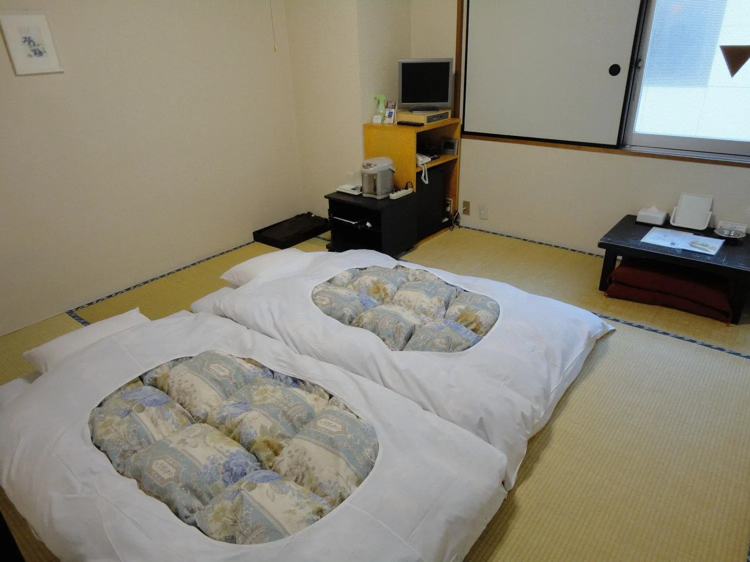 Photo of the whole room, Bed in Hotel Marutani