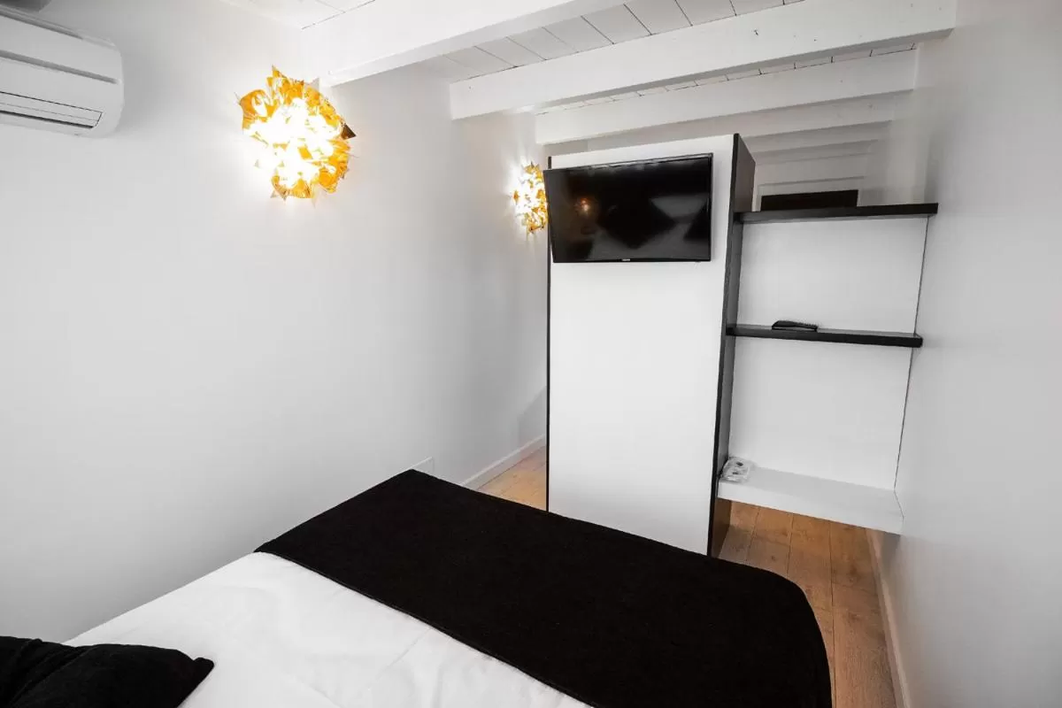 Bed in Hotel La Compagnia Del Viaggiatore