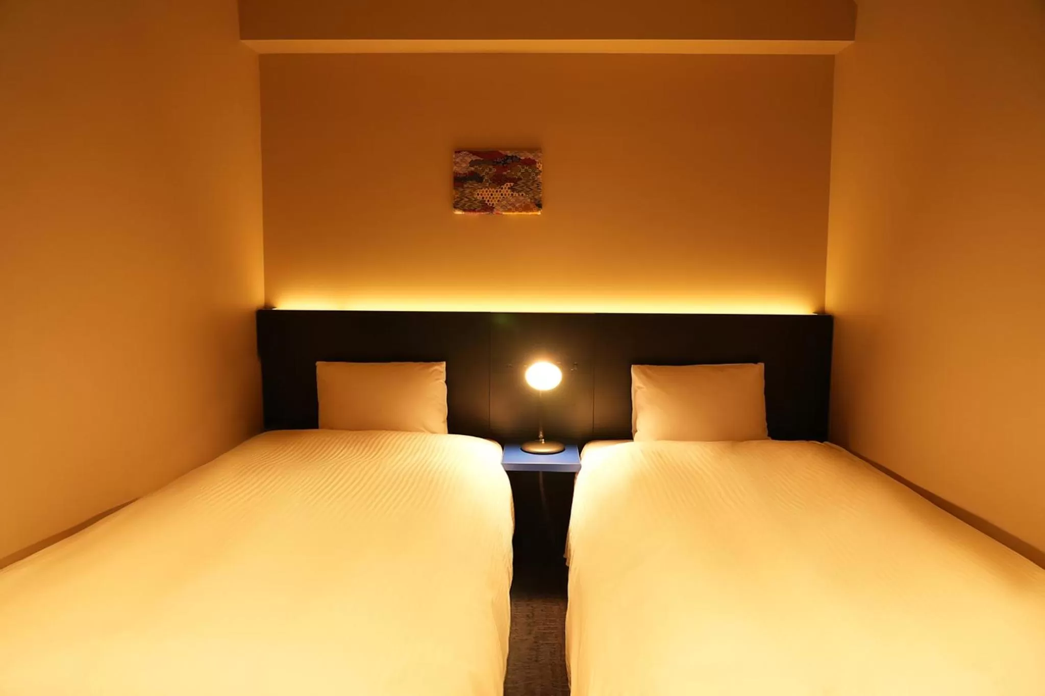 Bed in NPlus Hotel Higashikanda-akihabara