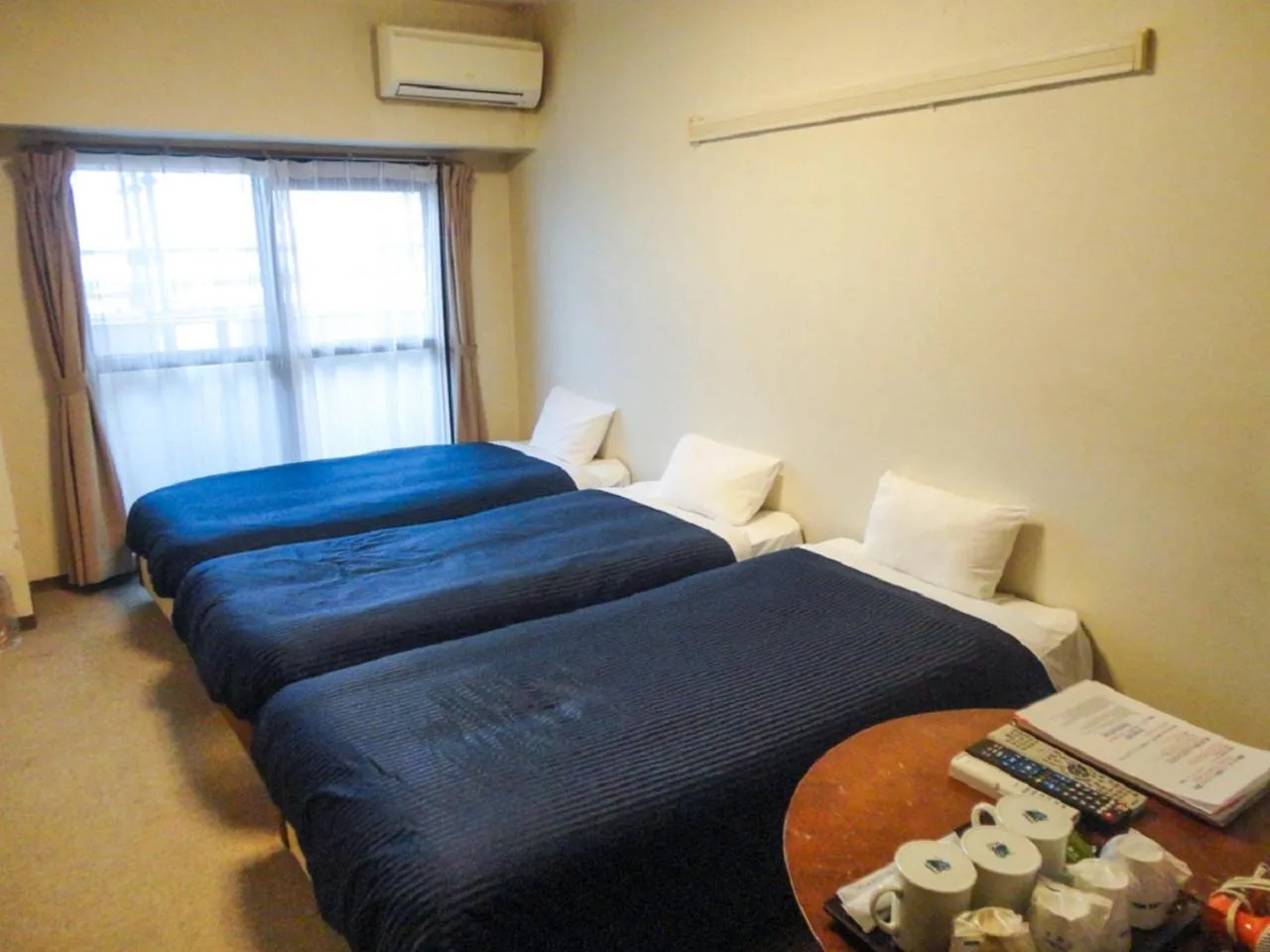 Bed in HOTEL LiVEMAX BUDGET Nagoya