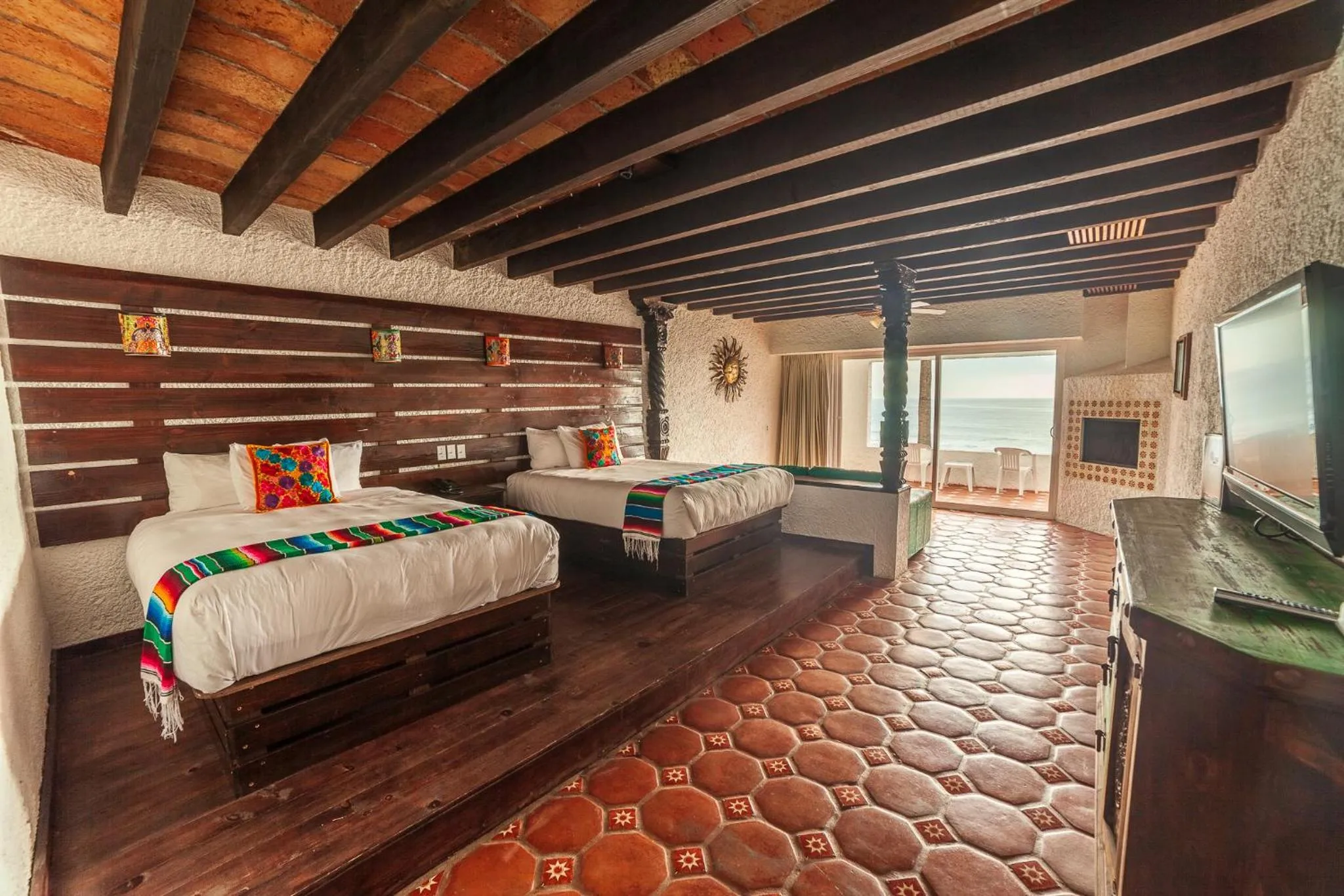 Bed in Las Rocas Resort & Spa