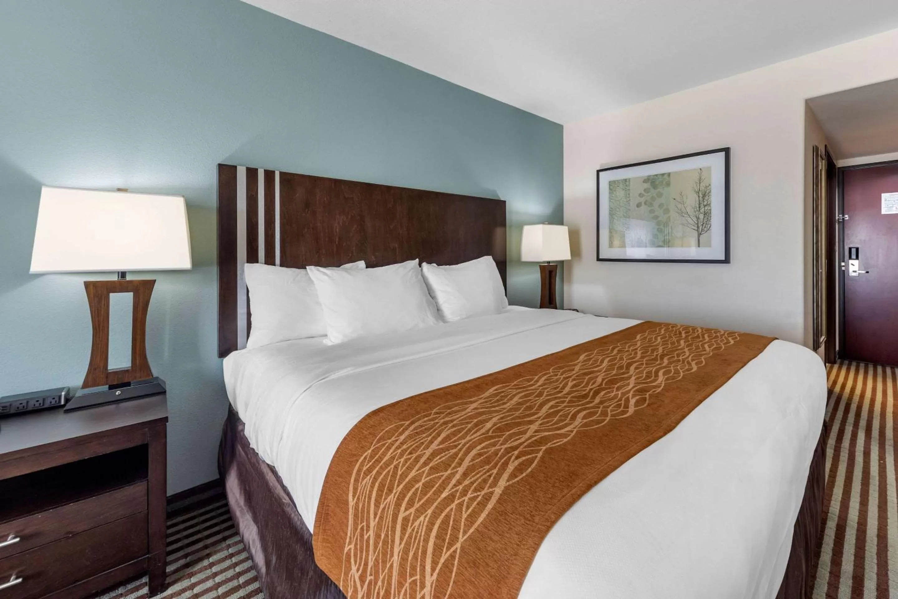 Photo of the whole room, Bed in Comfort Inn & Suites Perry I-35