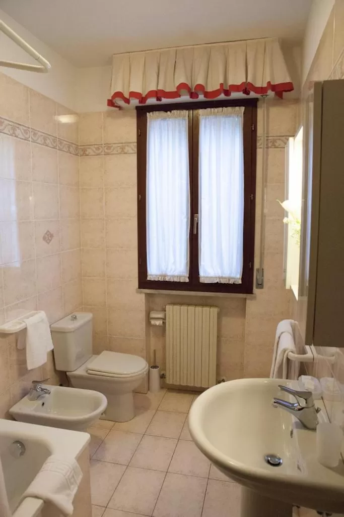 Bathroom in Giada Palace - Rooms