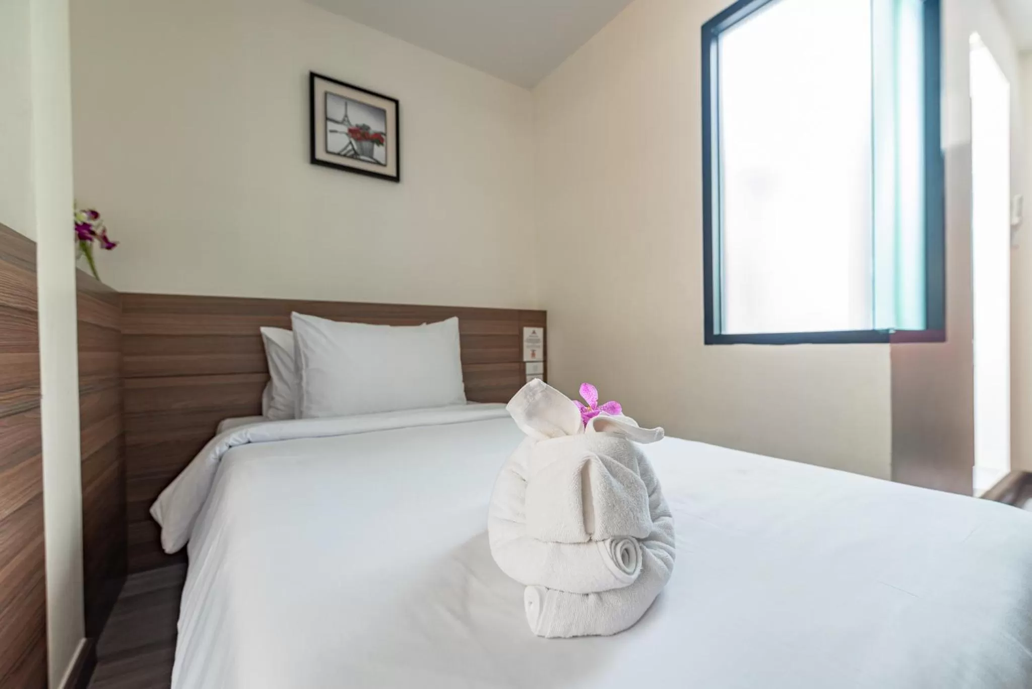 Bed in Sovereign Group Hotel at Pratunam