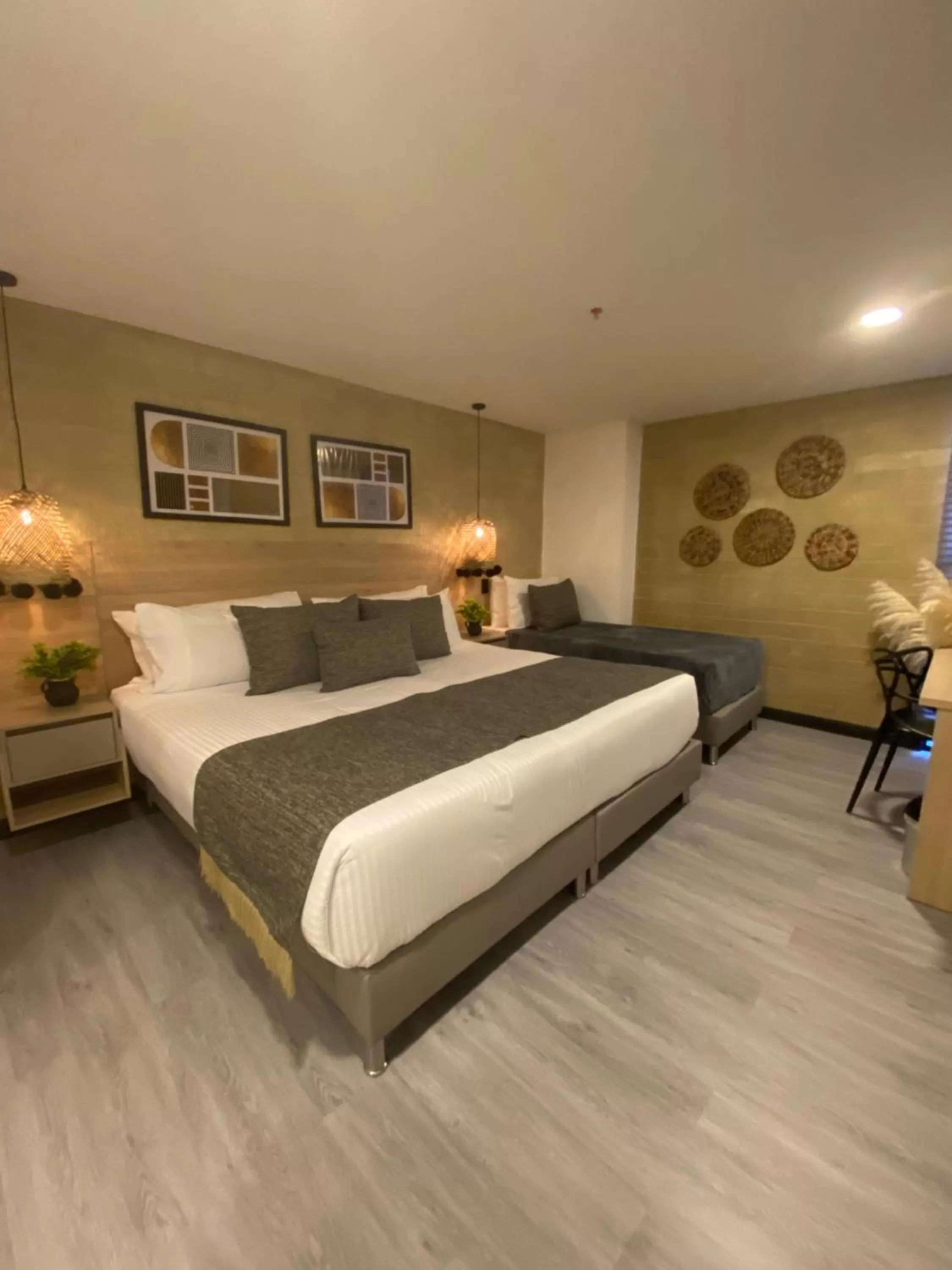 Photo of the whole room, Bed in First Class Hotel