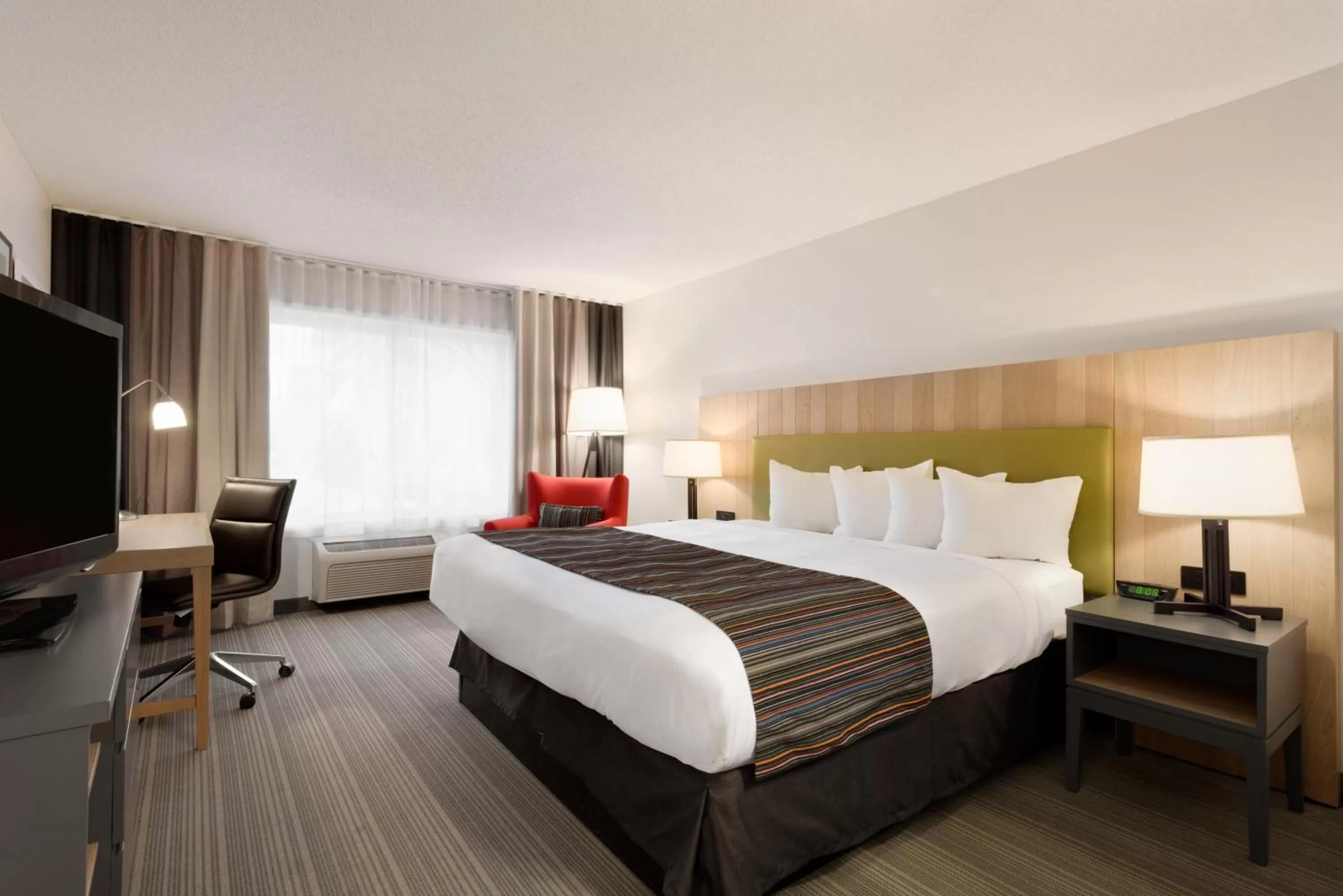 Photo of the whole room in Country Inn & Suites by Radisson, Chippewa Falls, WI