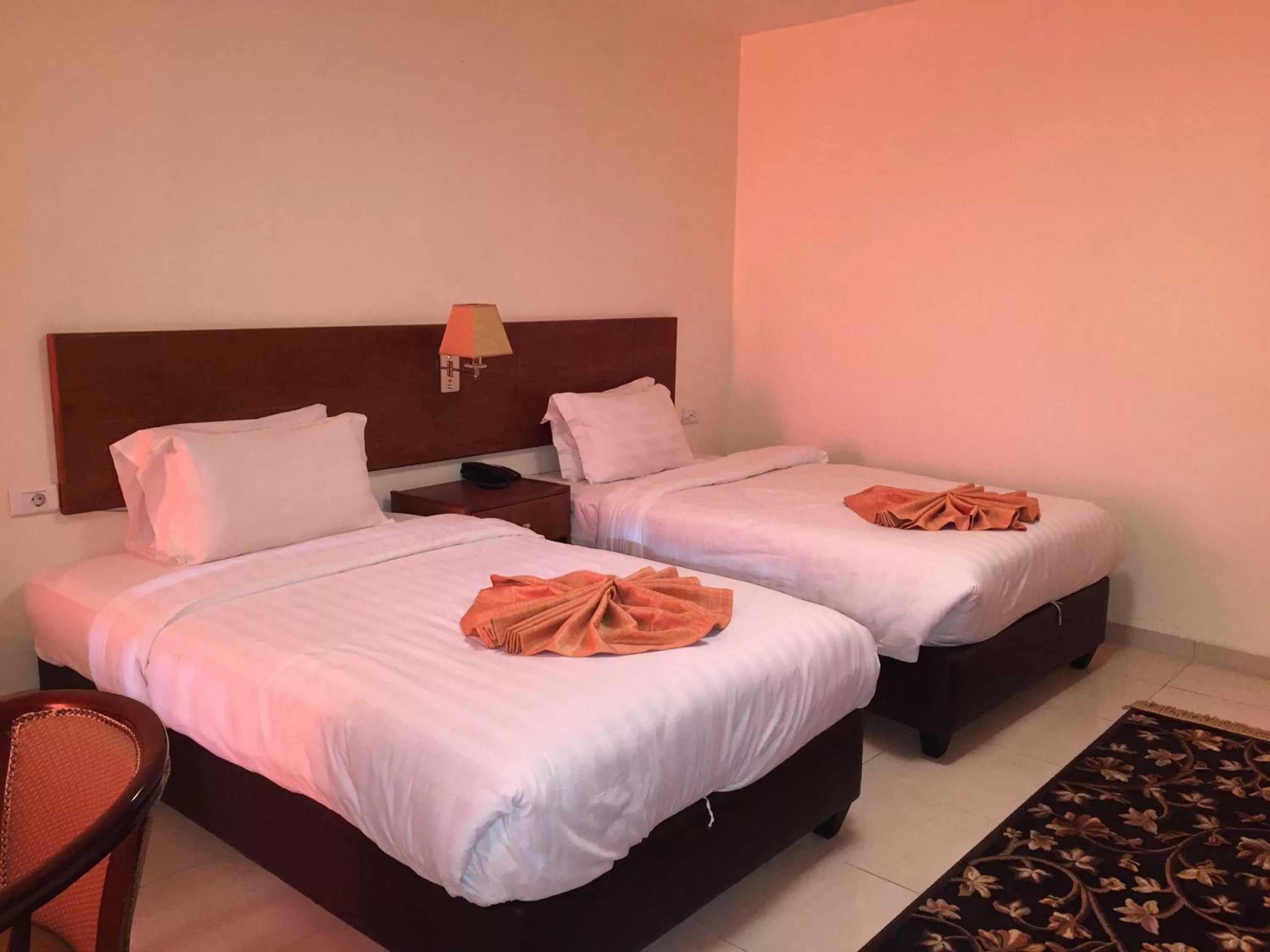 Bed in Zaina Plaza Hotel