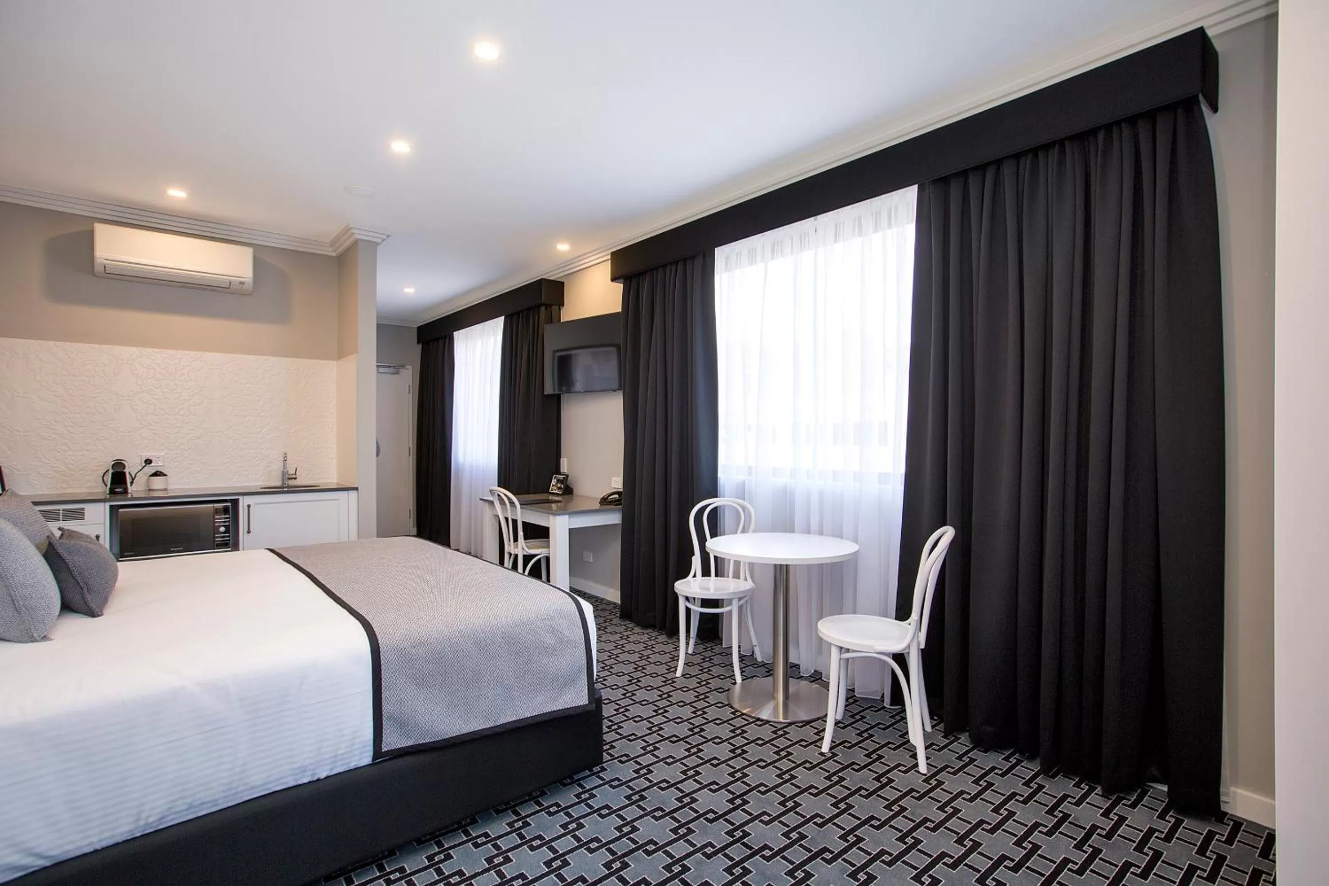 Bedroom, Bed in CH Boutique Hotel & Apartments, an Ascend Collection Hotel