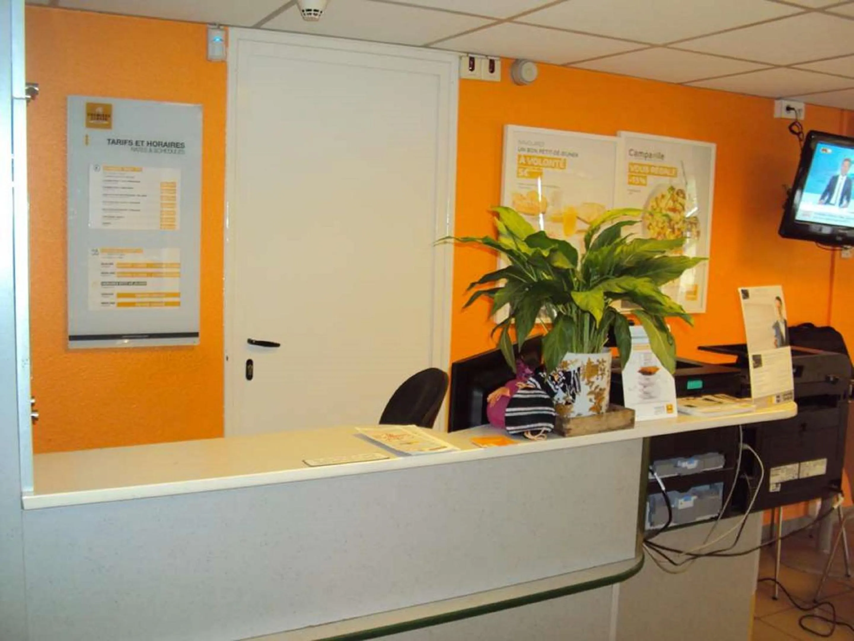 Lobby or reception in Premiere Classe St Etienne Nord Villars