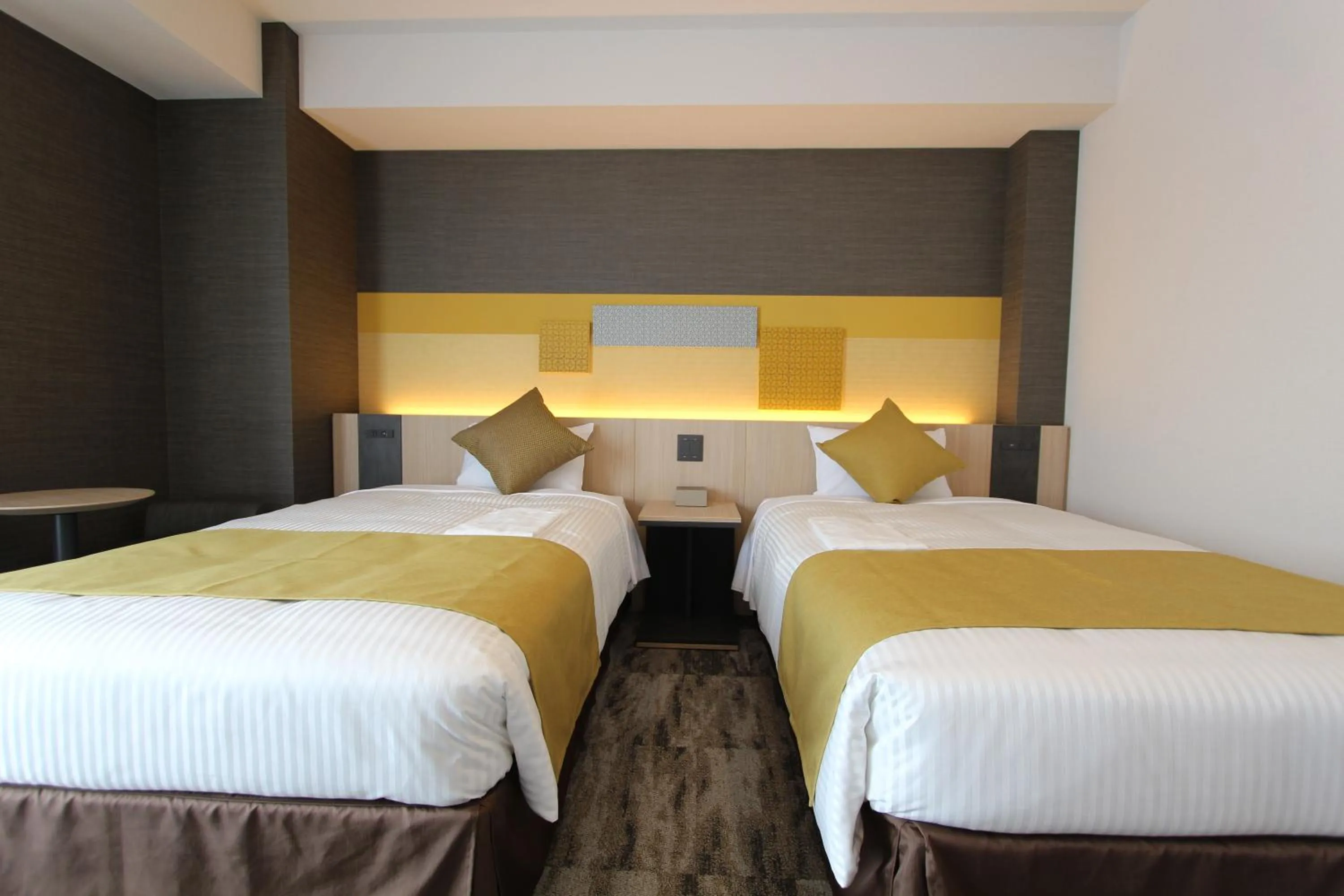 Bed in KOKO HOTEL Tsukiji Ginza