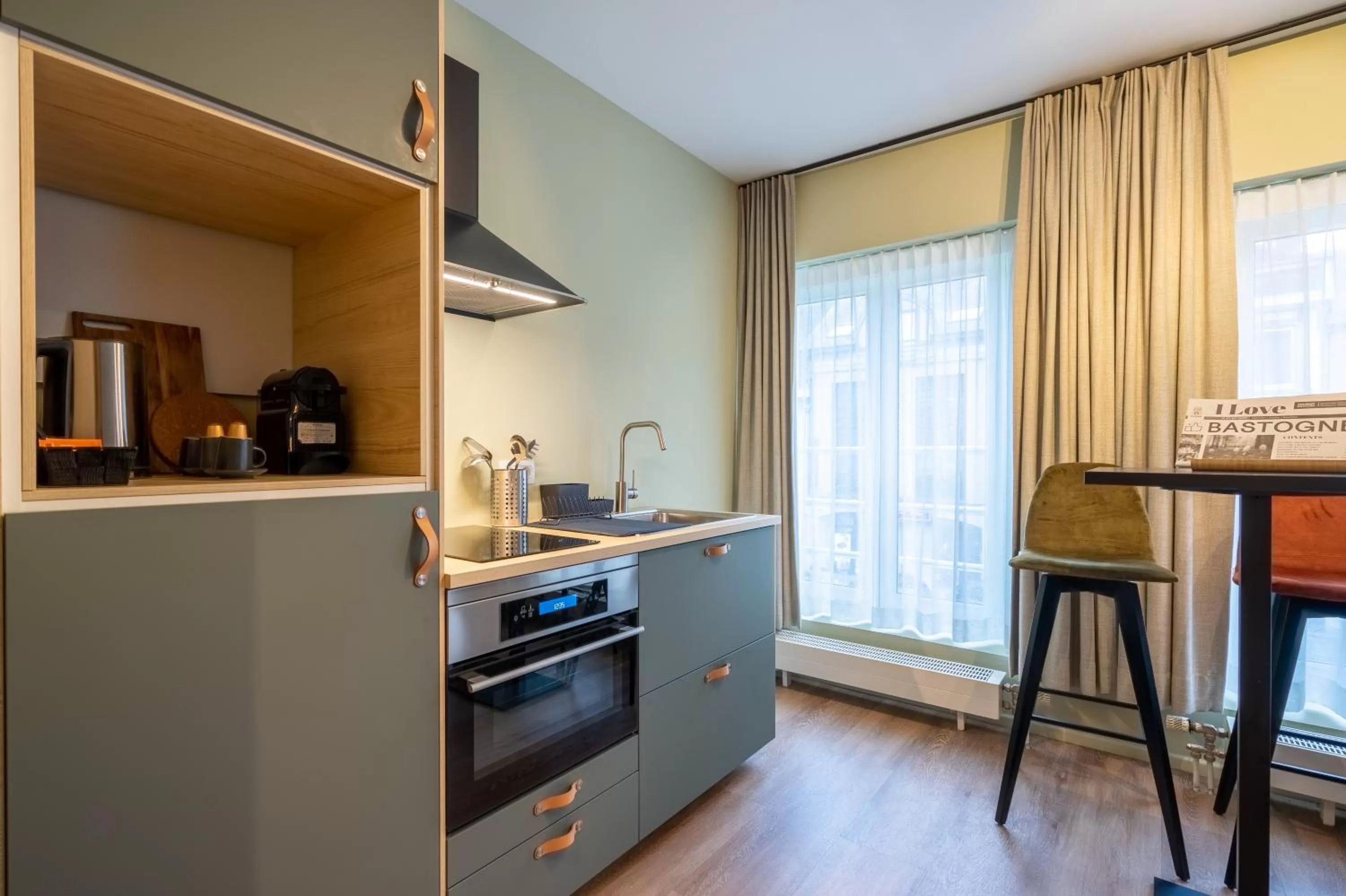 kitchen in Appart hôtel En Ville