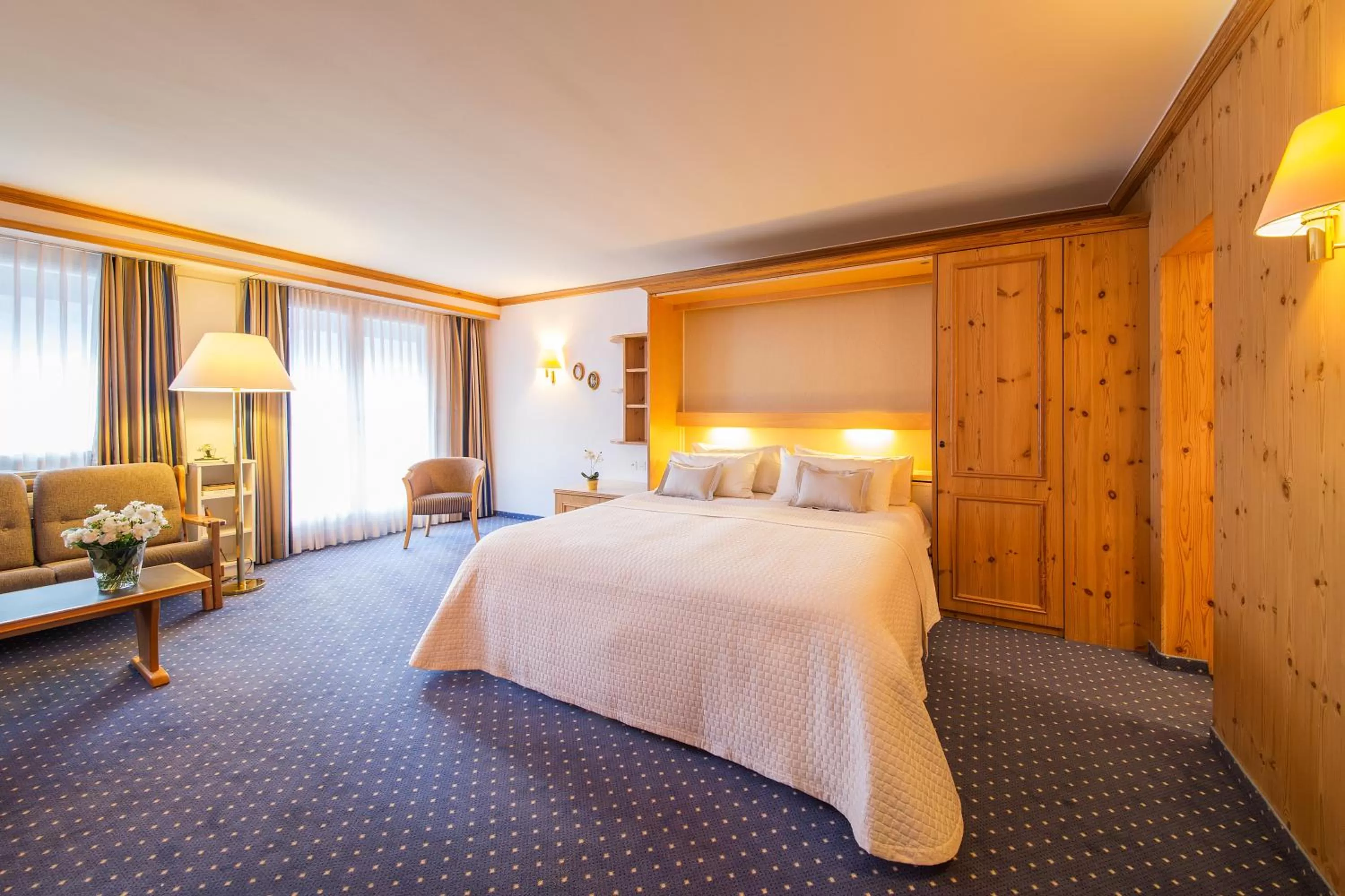 Bedroom, Bed in Hotel Europa Suites St Moritz