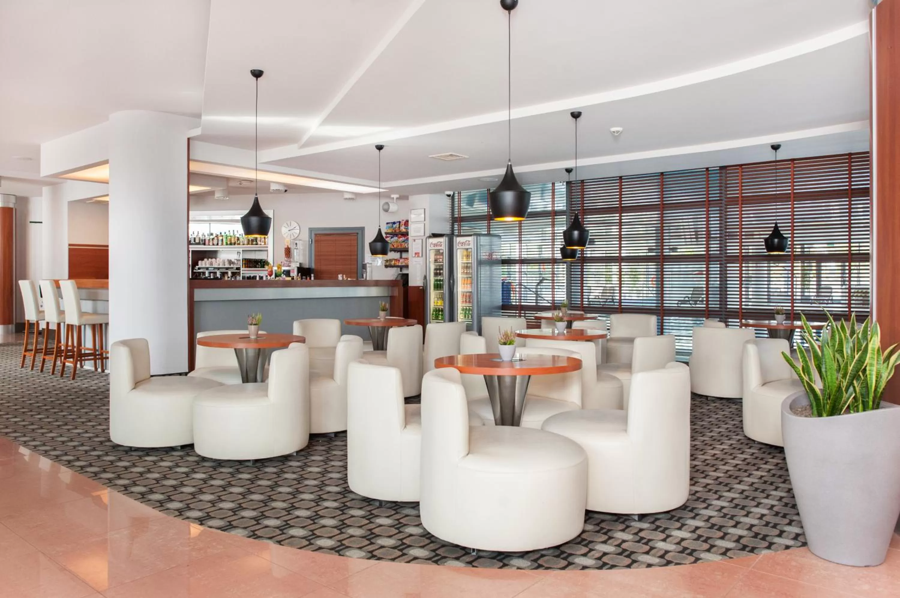 Lounge or bar in Ikar Plaza