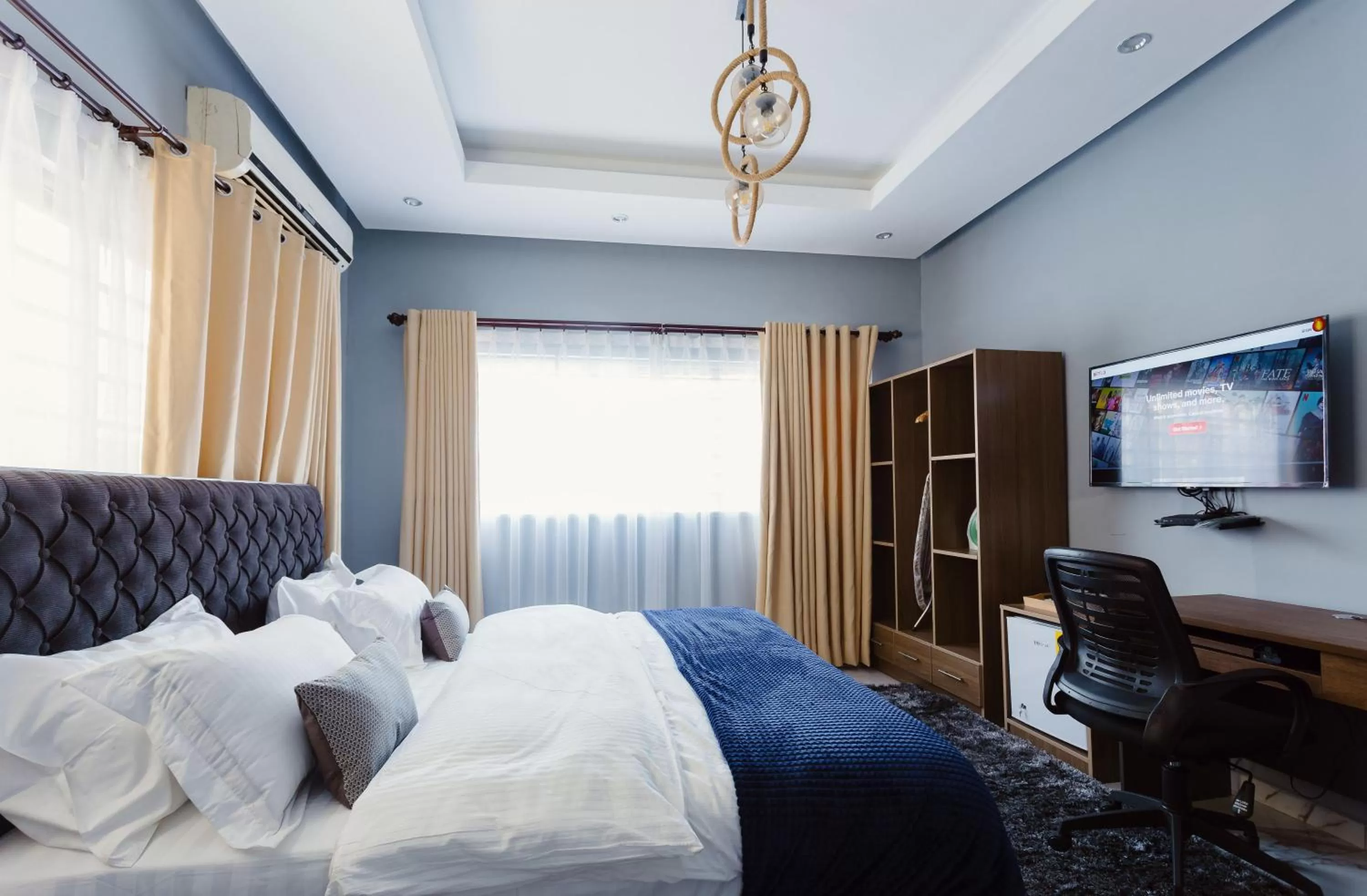 TV and multimedia, Bed in The Avery Suites, East Legon