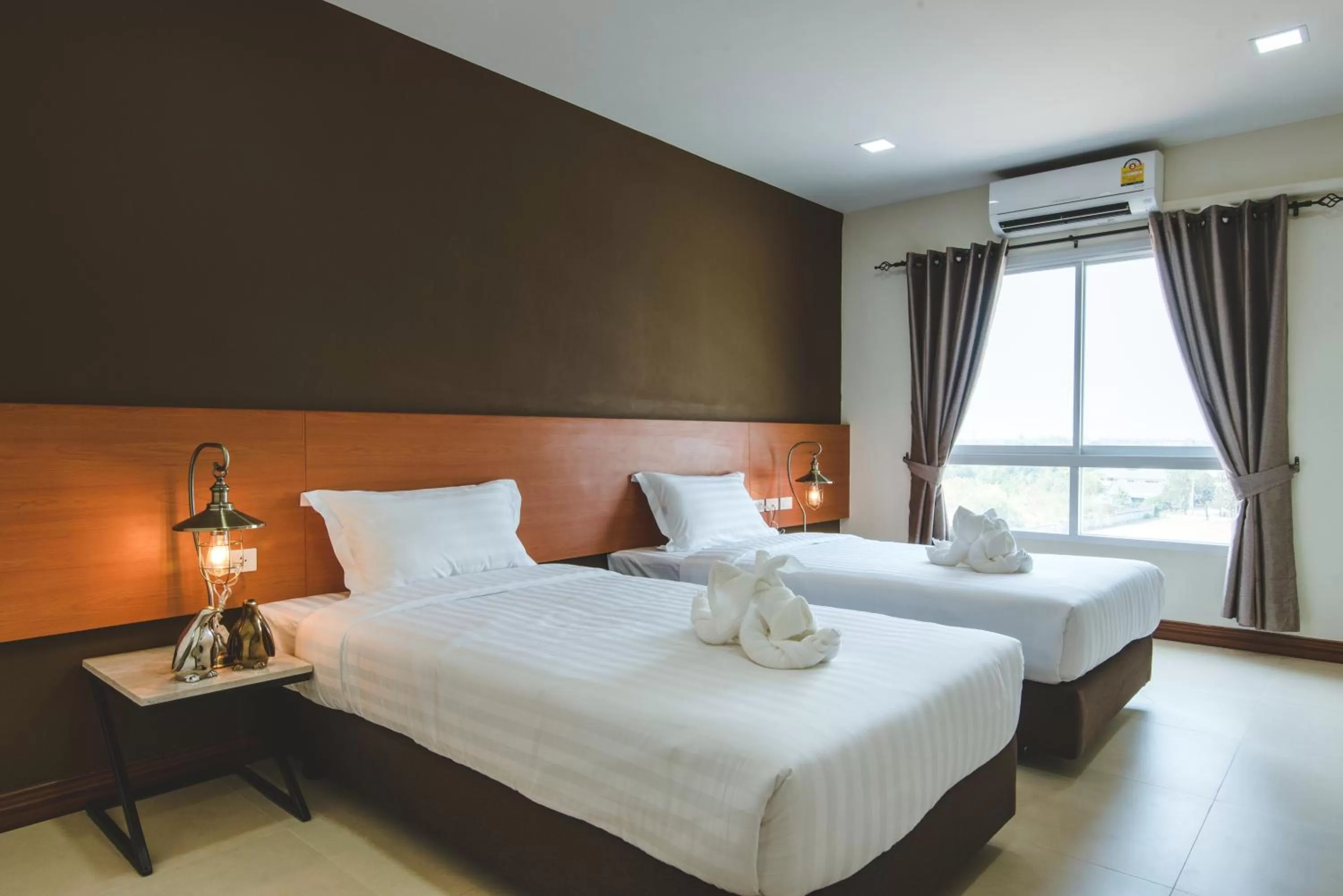 Bed in deVloft hotel Korat