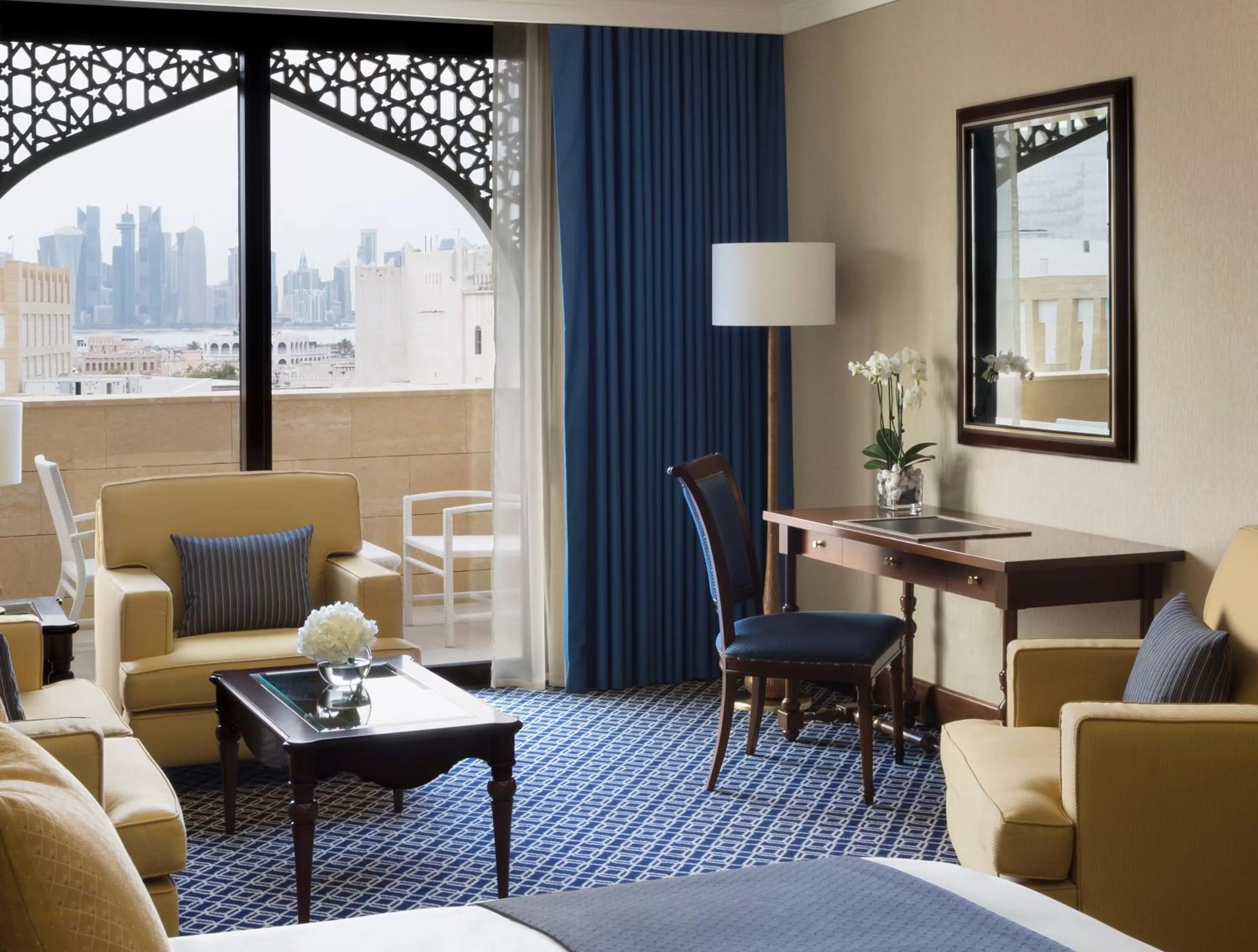 Seating area in Al Najada Doha Hotel by Tivoli