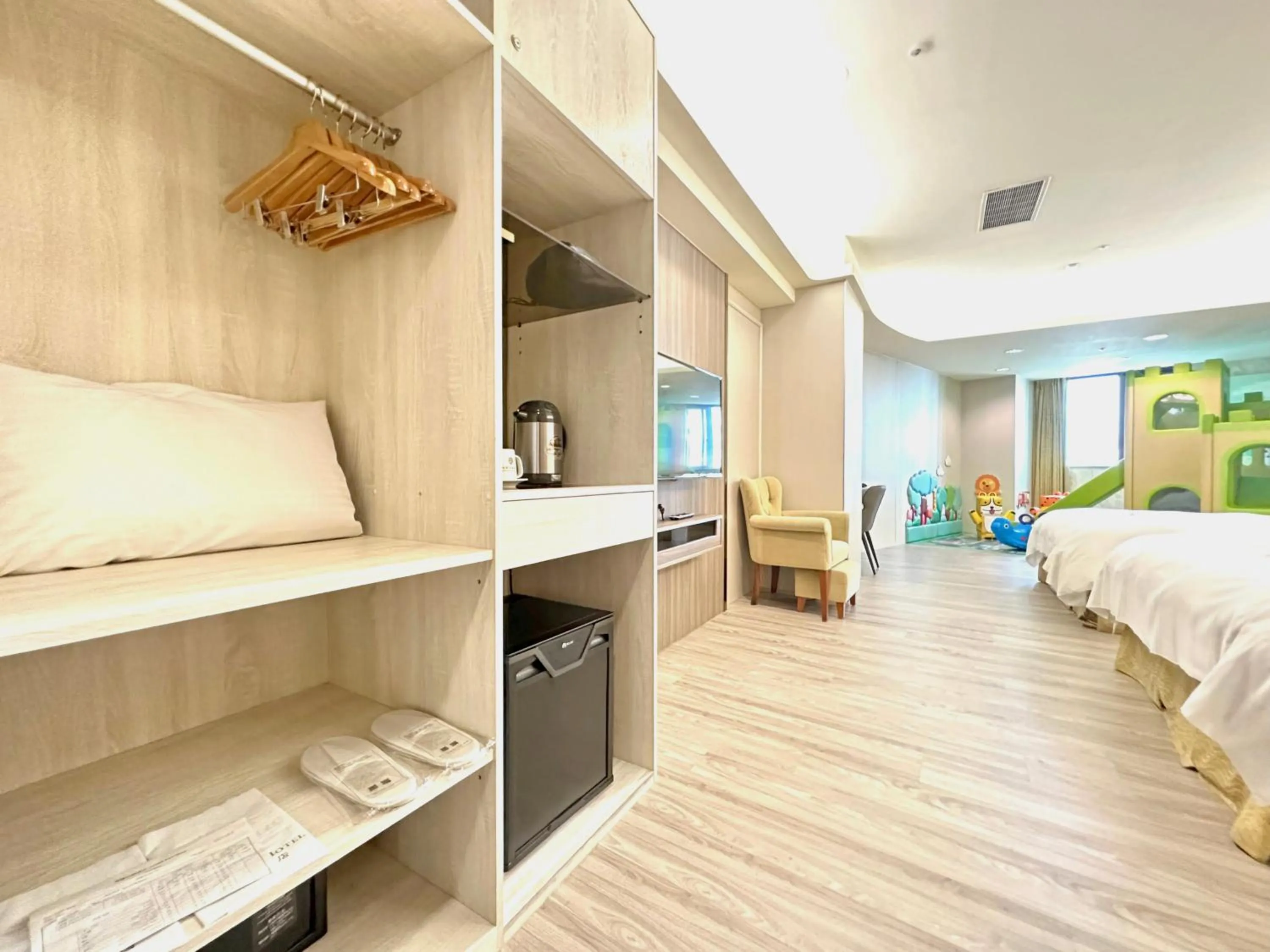 Bed in Grand Earl Hotel