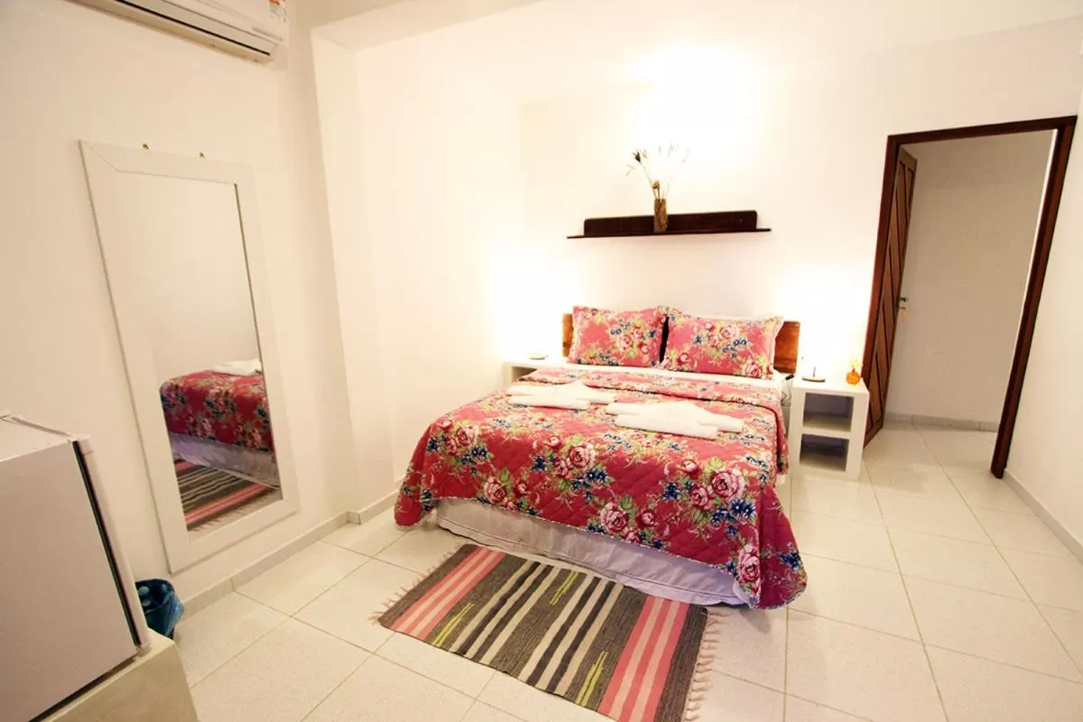 Two-Bedroom Suite with Sea View in Pousada Recanto da Praia