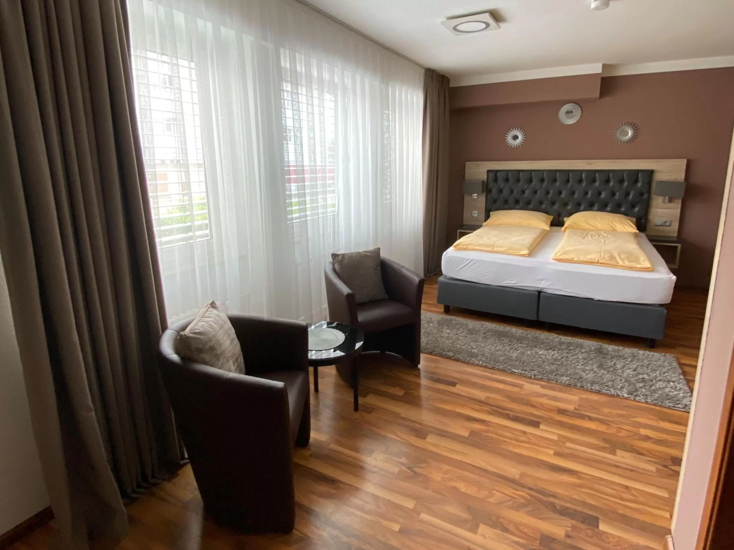 Bed in ZUM ZIEL Hotel Grenzach-Wyhlen bei Basel