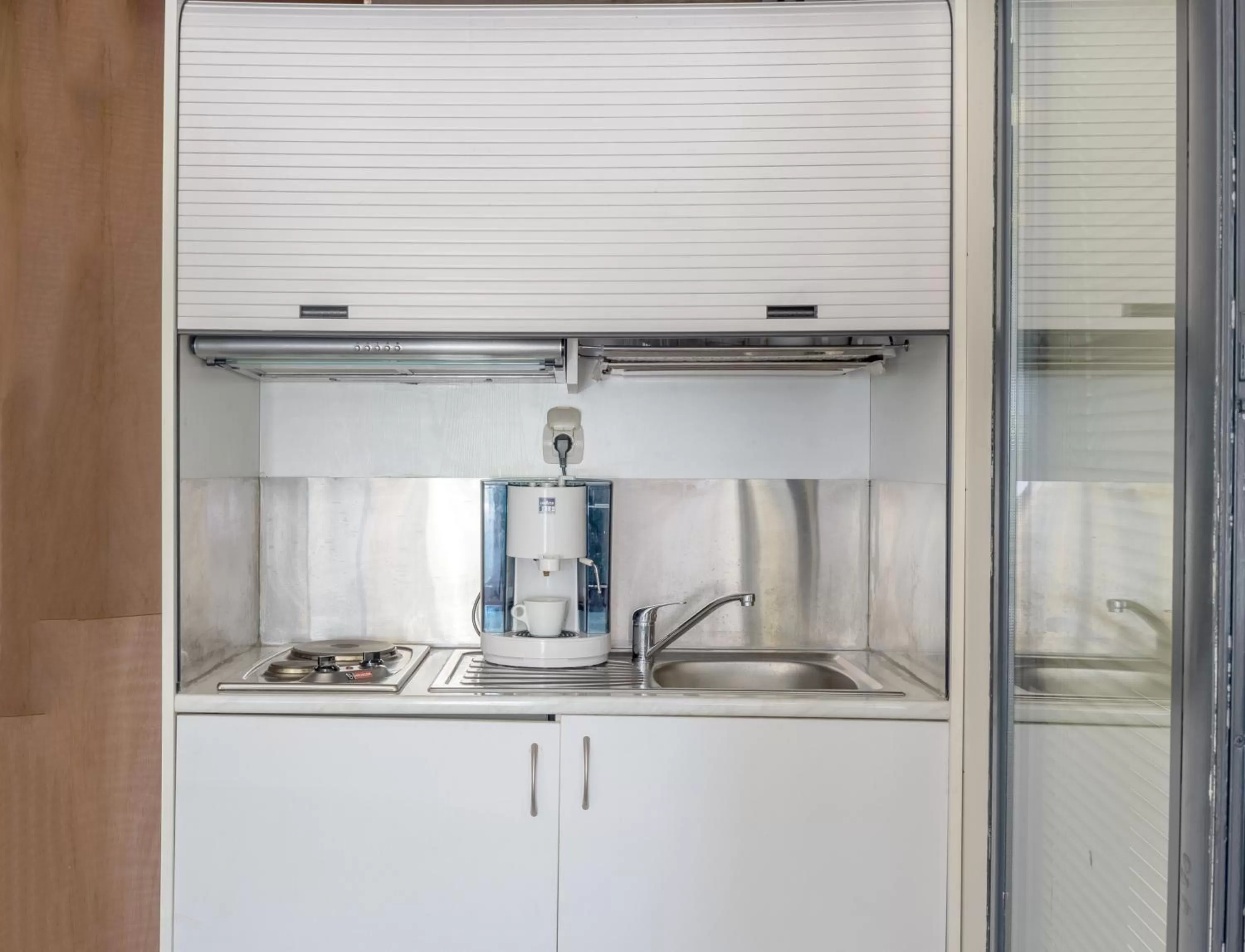 Kitchen or kitchenette in Arditou Akropolis Apartments-Suites