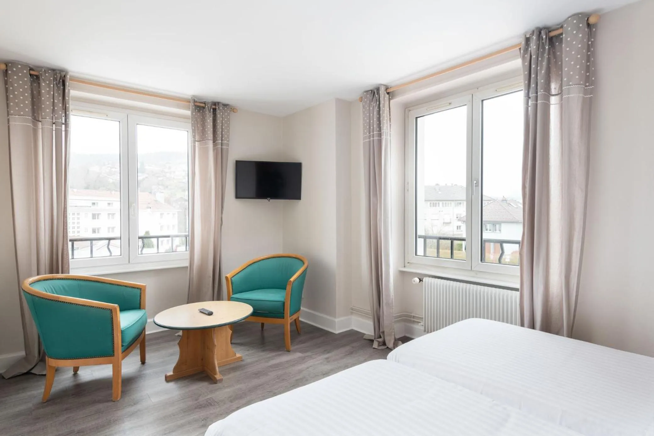 Bed in Hôtel De La Paix