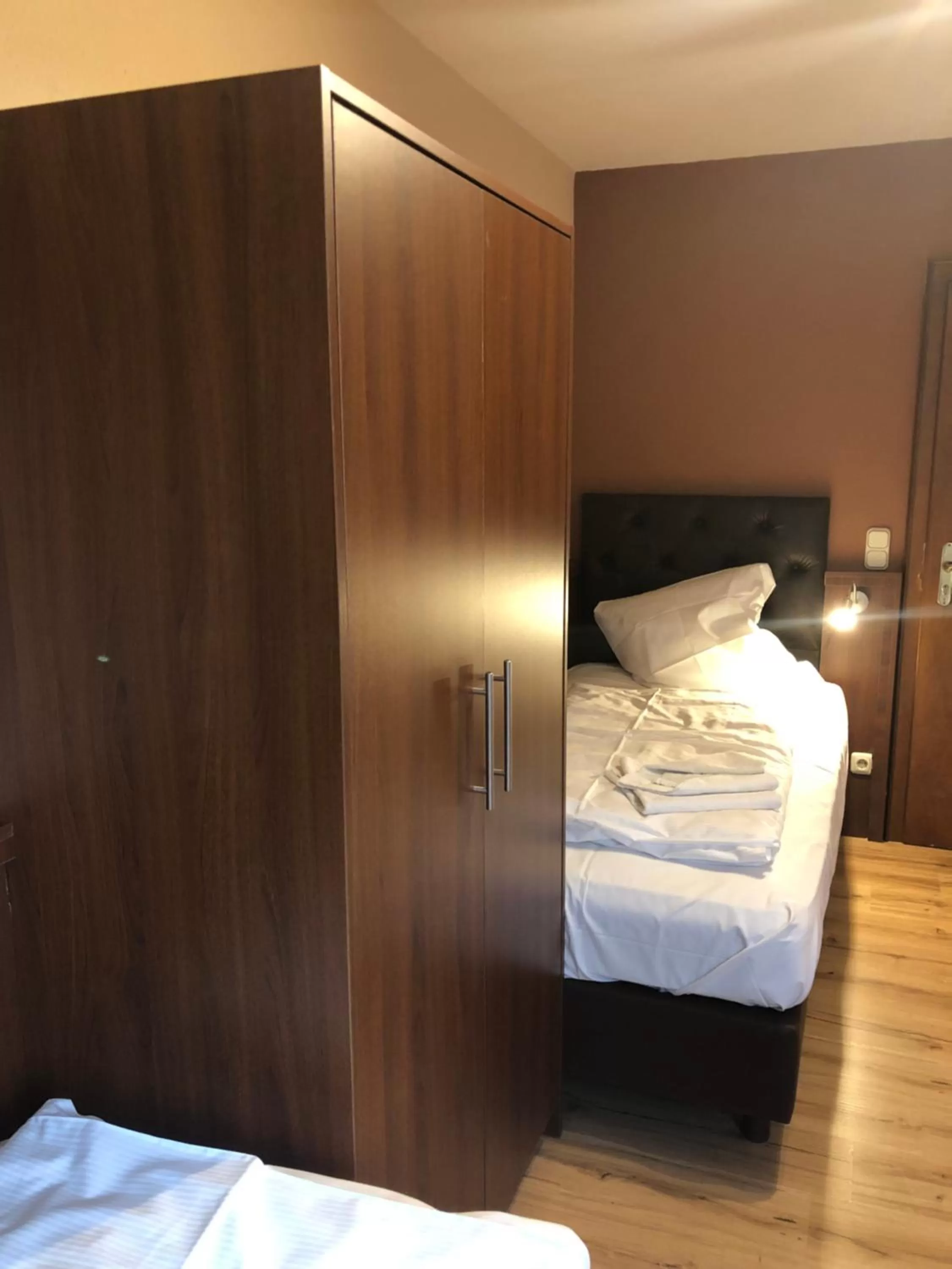 Bed in Hotel Poseidon