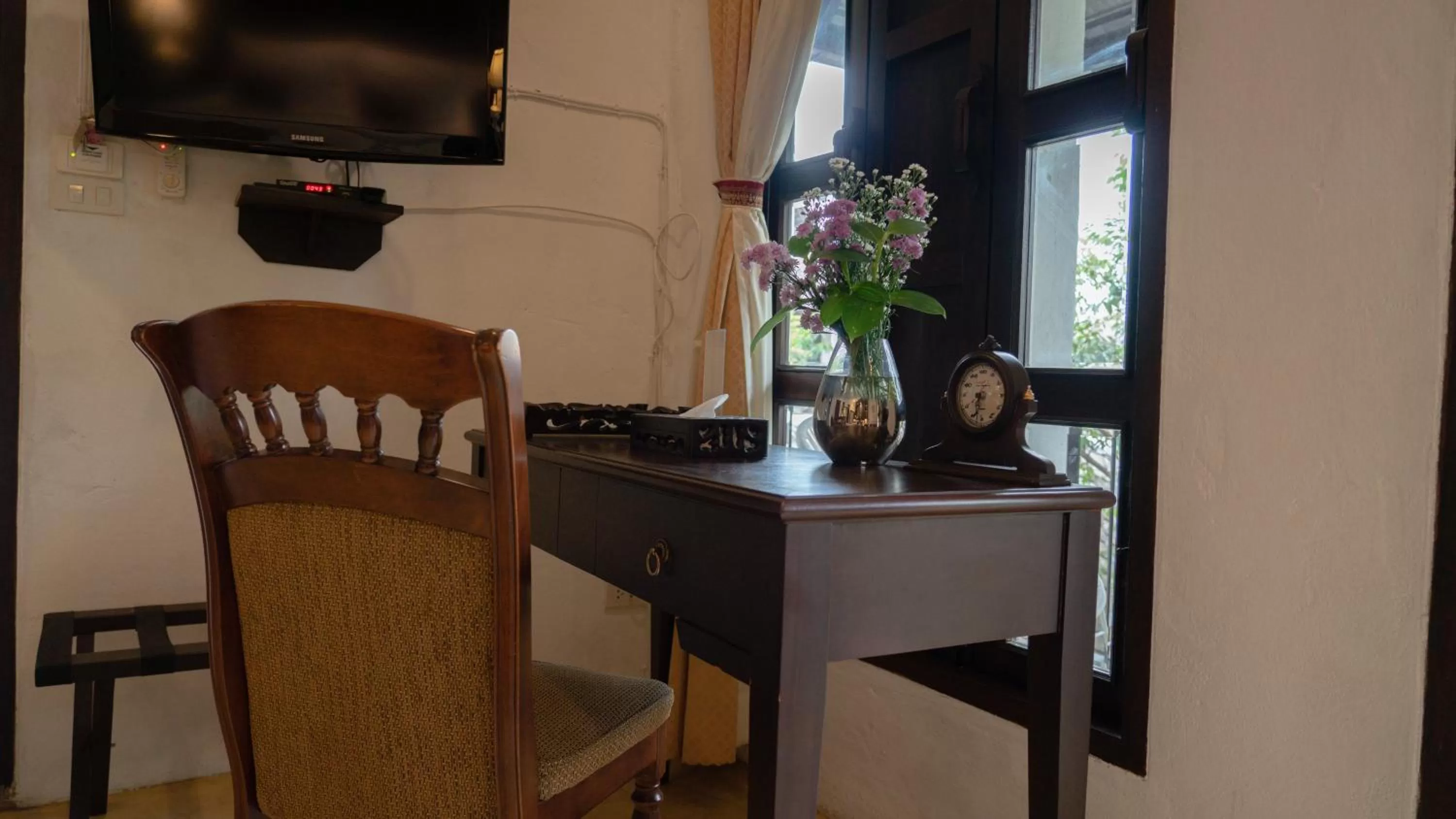 Decorative detail, TV/Entertainment Center in Cheva Gallery Boutique Hotel